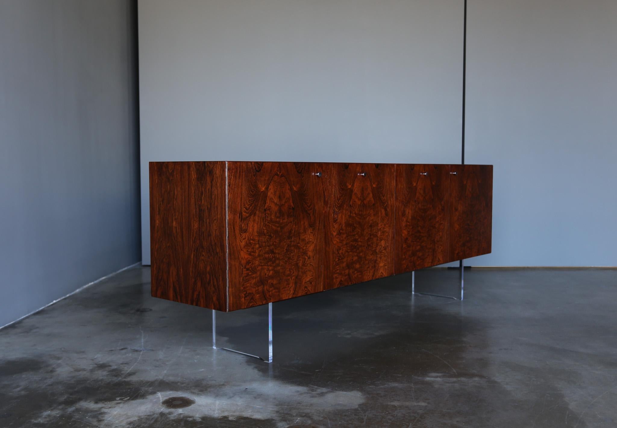 Poul Nørreklit Rosewood & Lucite Credenza for Georg Petersens, circa 1960.  A Seldom Seen Example w/ Lucite Legs.  This piece has been expertly restored.  