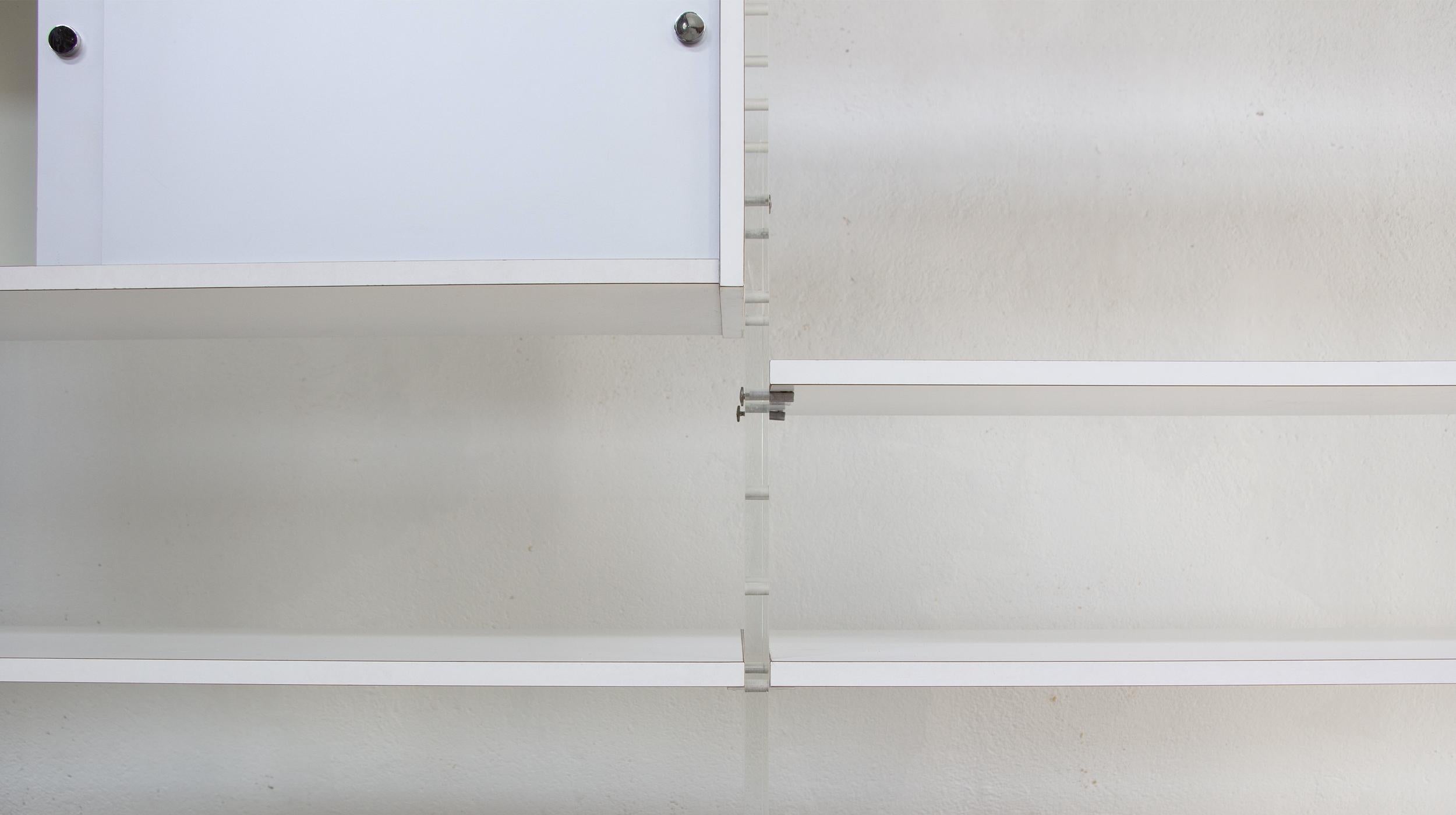 Poul Nørreklit bookcase for Georg Petersens

Stamped on some modules and shelves: 