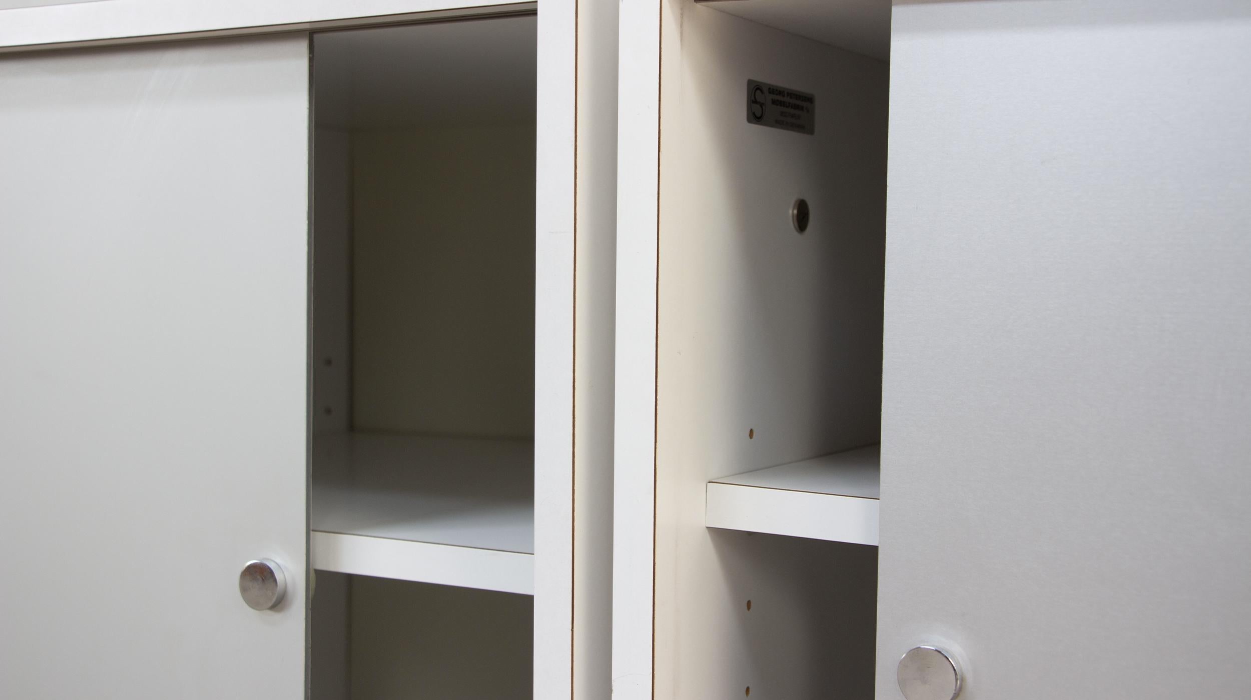 Minimalist Poul Nørreklit wall unit for Georg Petersens
