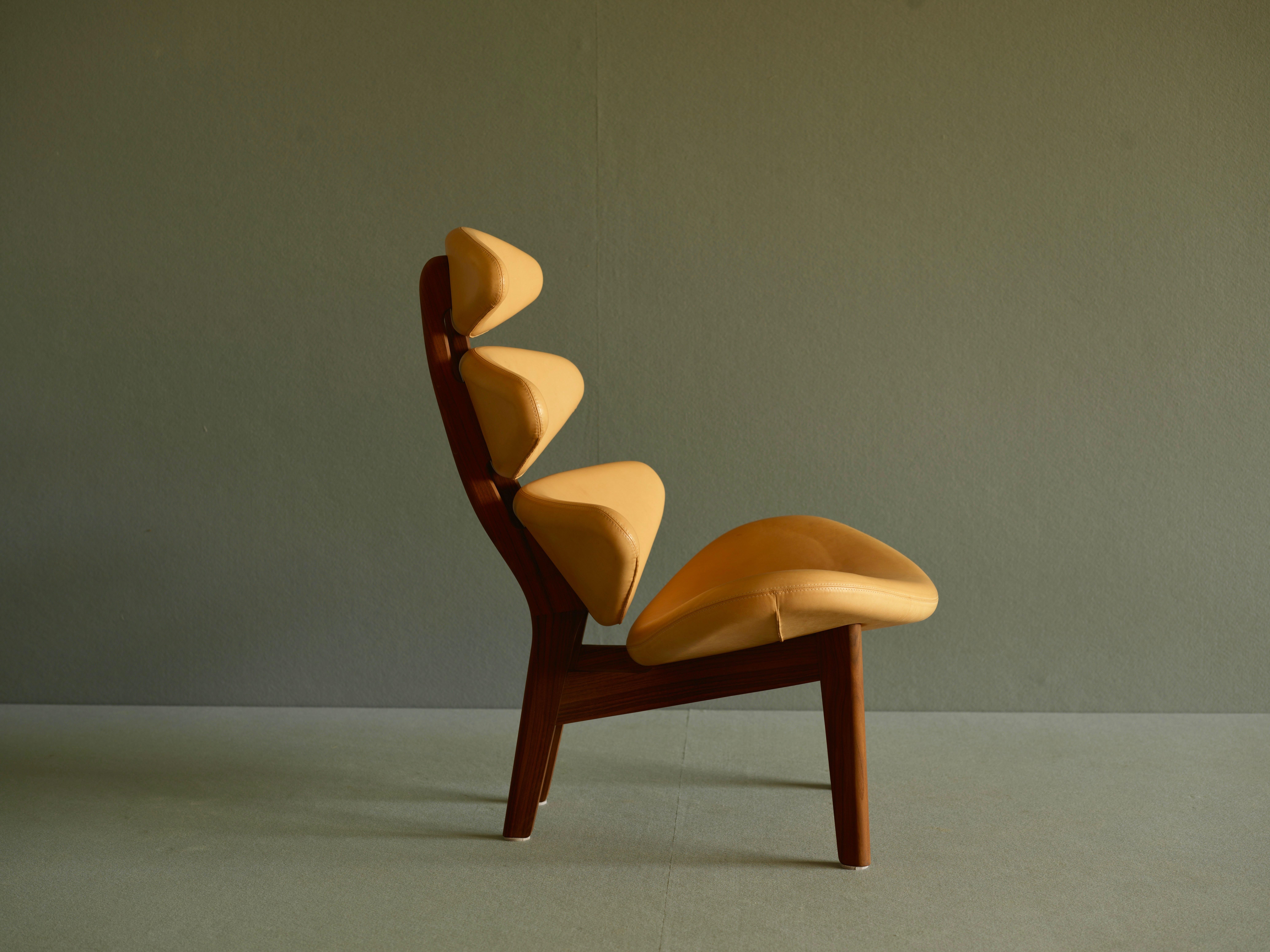 Chair by Poul M. Volther. Corona EJ-5 Classic for Erik Jorgensen. This is the Anniversary model. The frame is in untreated, solid walnut and the seat upholstered in vegetable natural leather.

Volther’s “Corona” chair was unveiled in 1961.