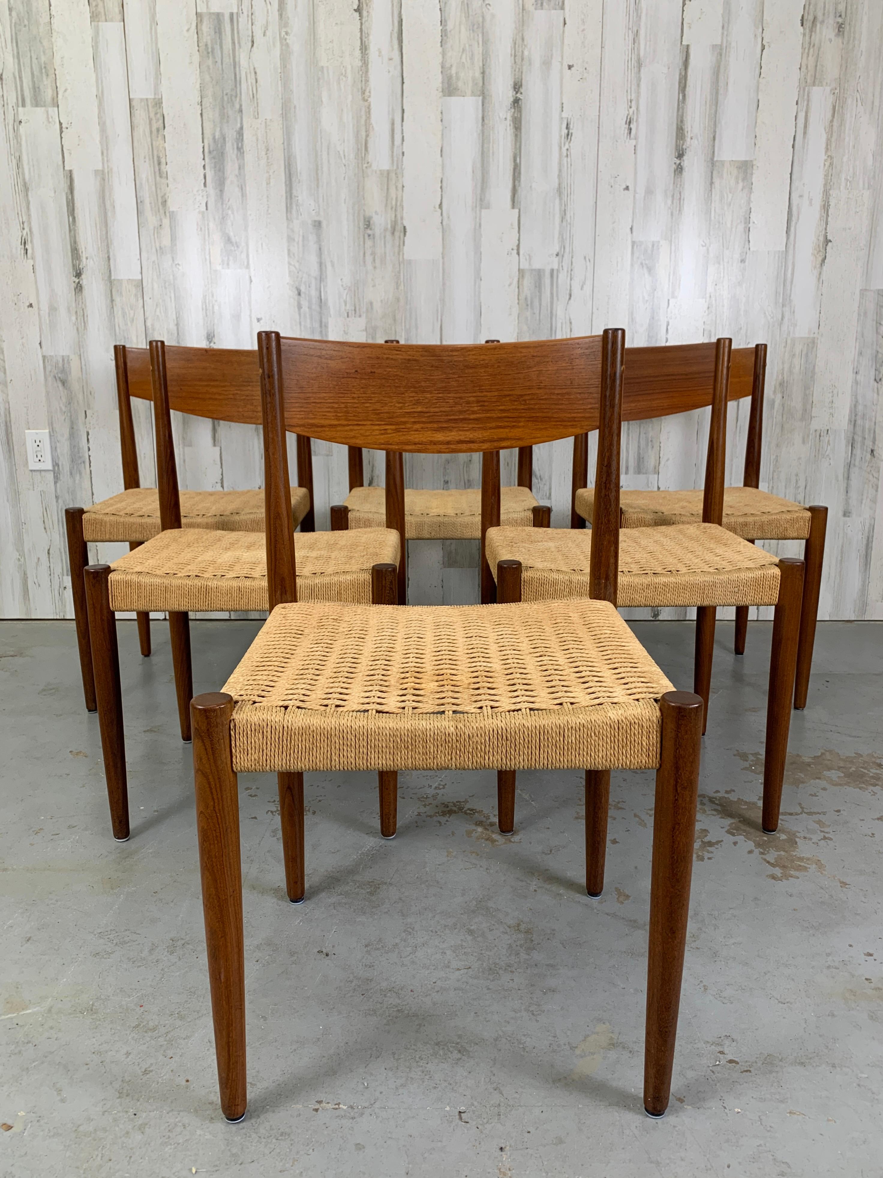 Set of six sculpted Teak with Danish cord seat dining chairs in very well cared for original condition.