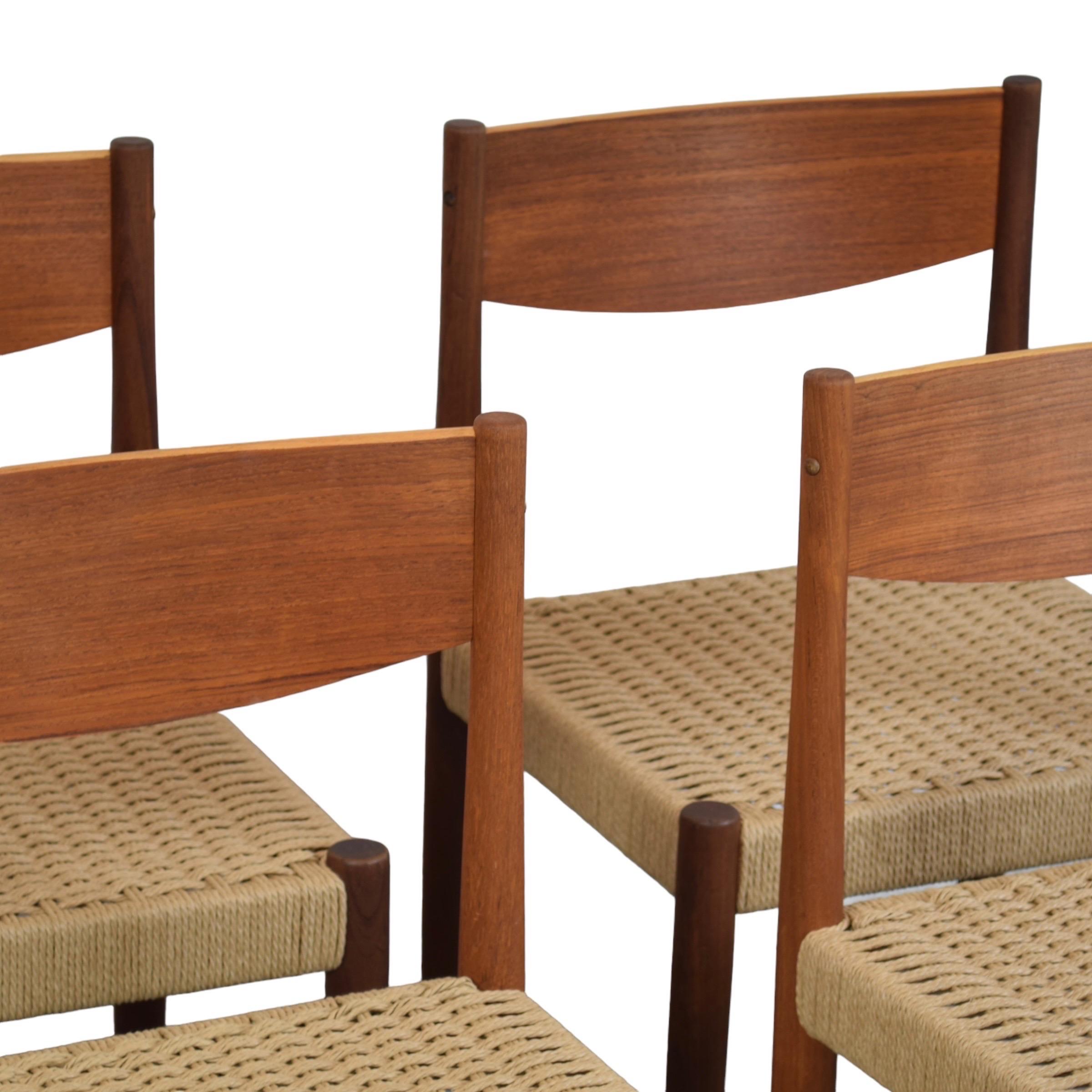 Condition: Refinished & Re-corded

Dimensions: 18.5” L x 18.5” D x 31” H (17” SH)

Description: A set of 4 vintage teak dining chairs by Poul Volther. Made in Denmark, circa 1960s. Freshly re-corded in Danish paper cord. Frames have been refinished