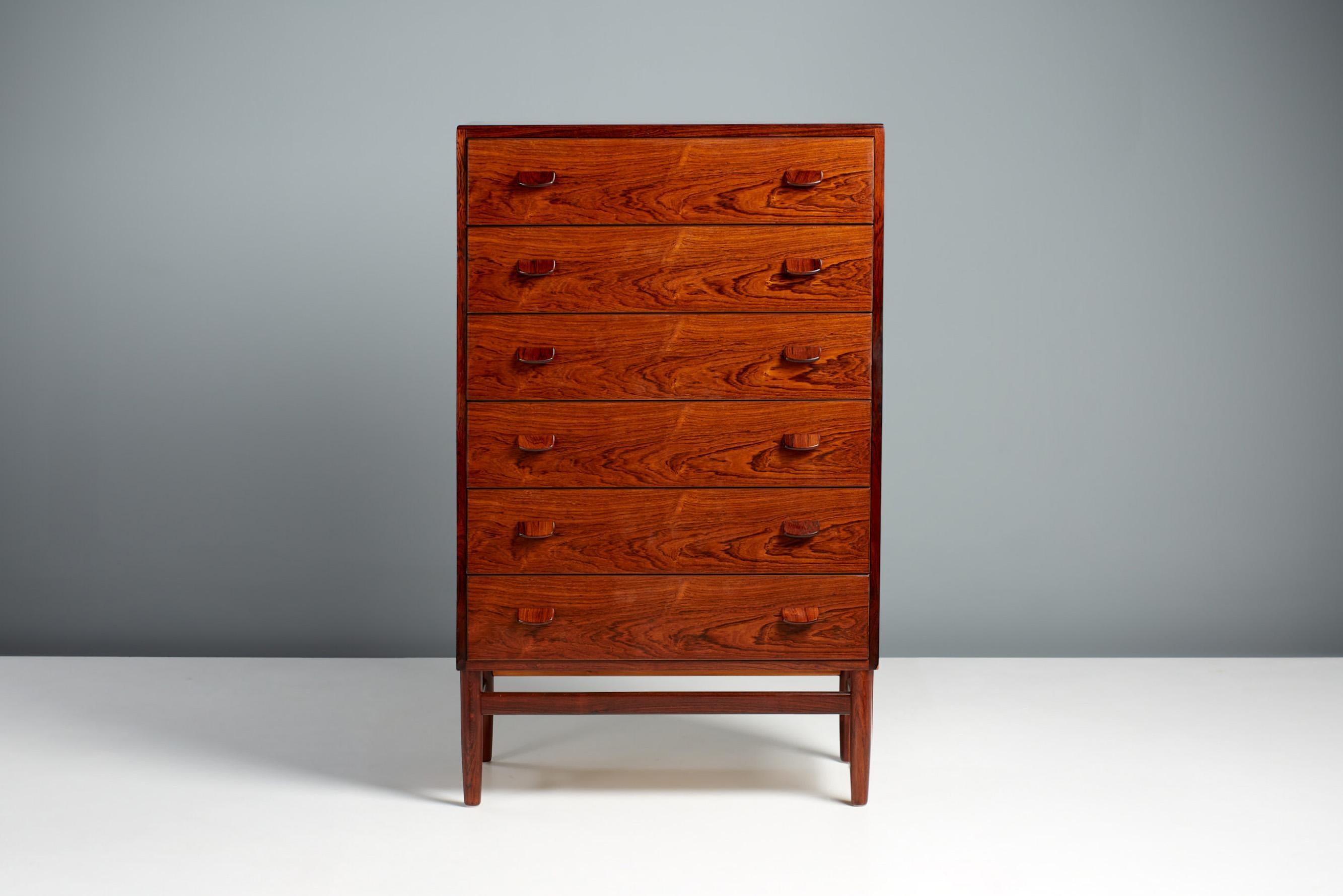 Poul Volther, Model F-17 chest of drawers, circa 1950s.

A tall chest of drawers made from exquisite solid and veneered rosewood with six drawers. The chest is in immaculate condition and has been carefully resotred at our workshops in London.
