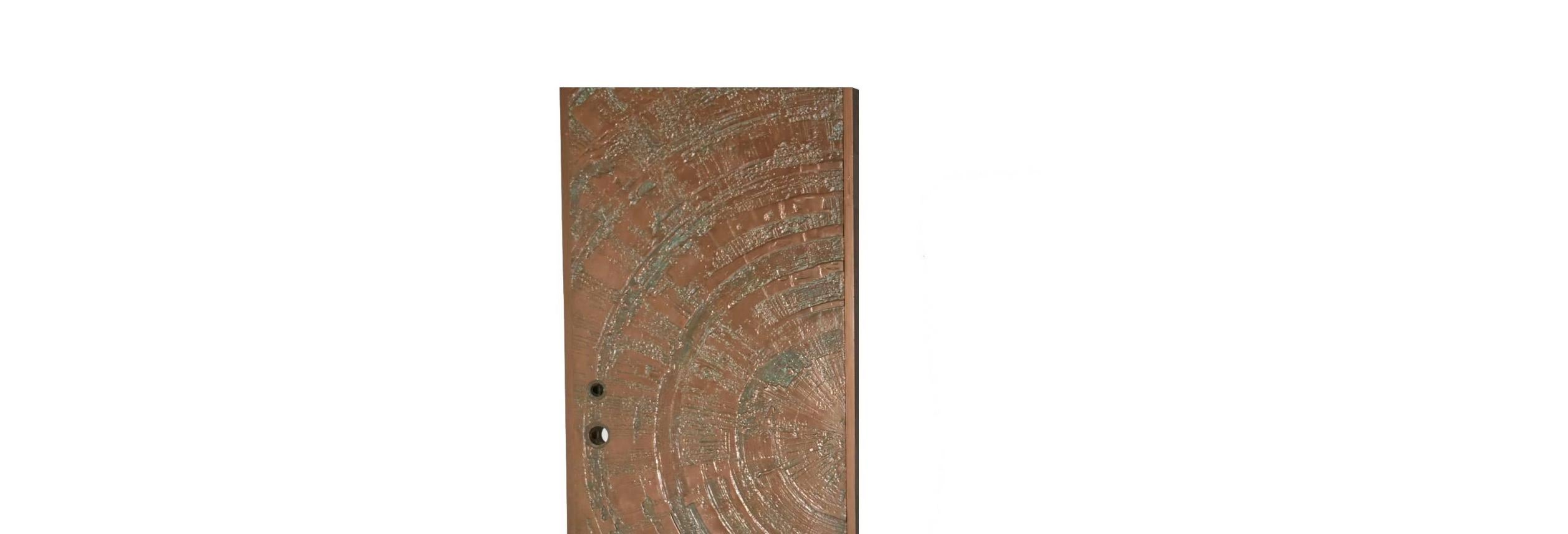By Forms and Surfaces circa 1960-1970, a textured, bonded and poured bronze door in an abstract Sunburst design. An absolutely stunning and eye-catching door, this item comes from deadstock and has never been used, so it is in excellent condition