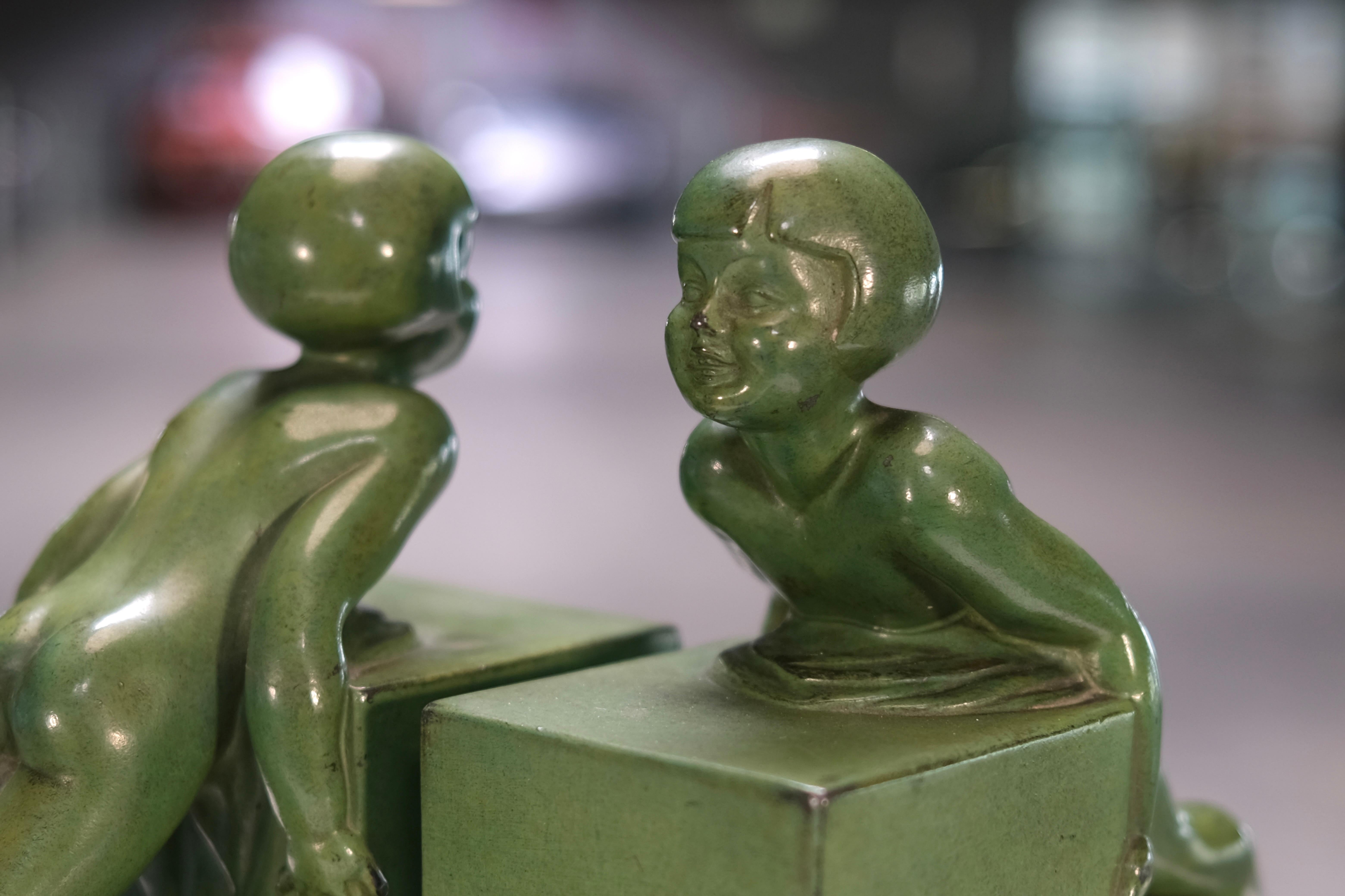 Patinated French Art Deco Bookends POUSSÉE by Janle for Max Le Verrier, France, 1930s