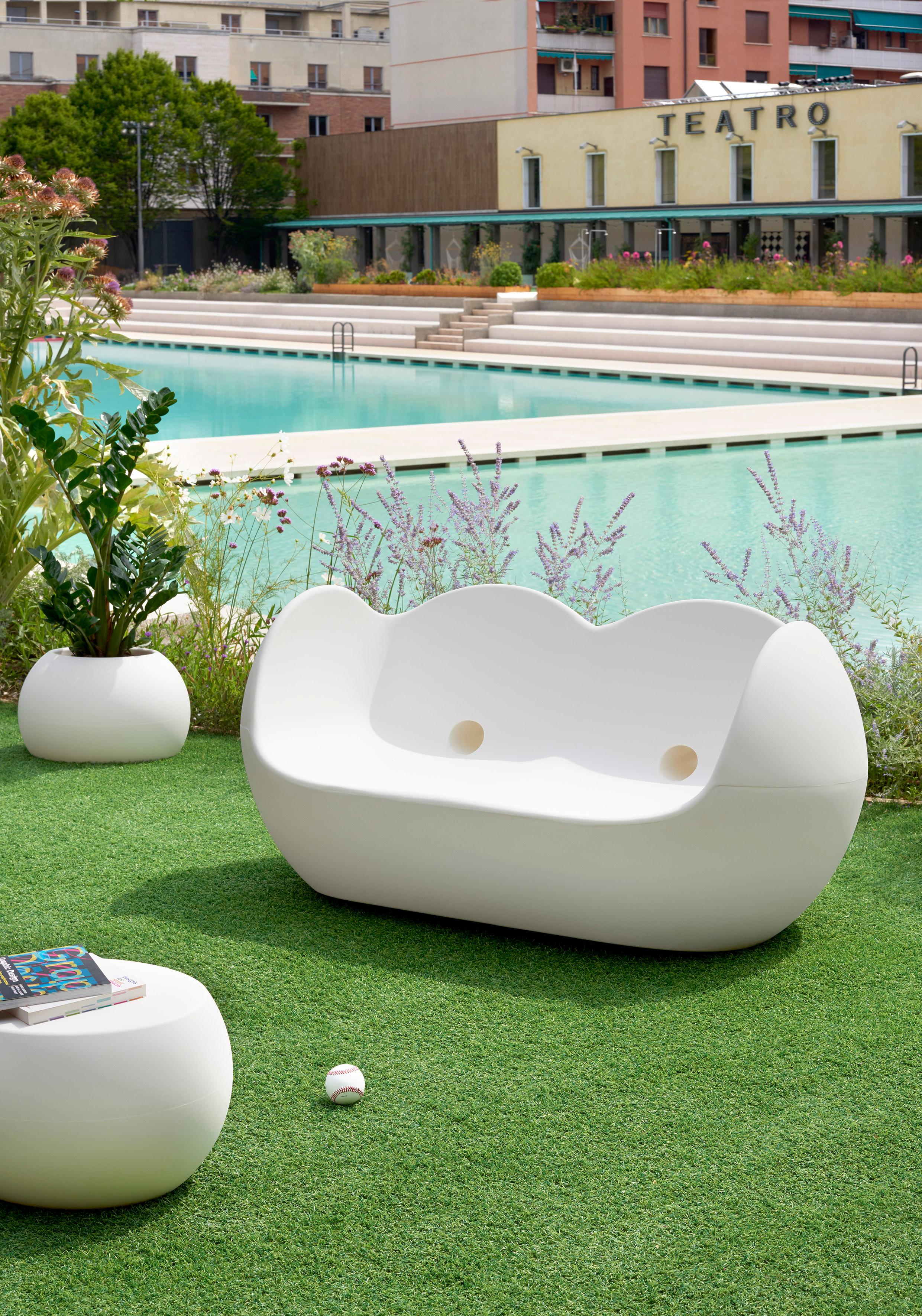Powder Blue Blossy Rocking Sofa by Karim Rashid
Dimensions: D 85 x W 159 x H 75 cm. Seat Height: 34 cm.
Materials: Polyethylene.
Weight: 38 kg.

Available in different color options. This product is suitable for indoor and outdoor use. Please