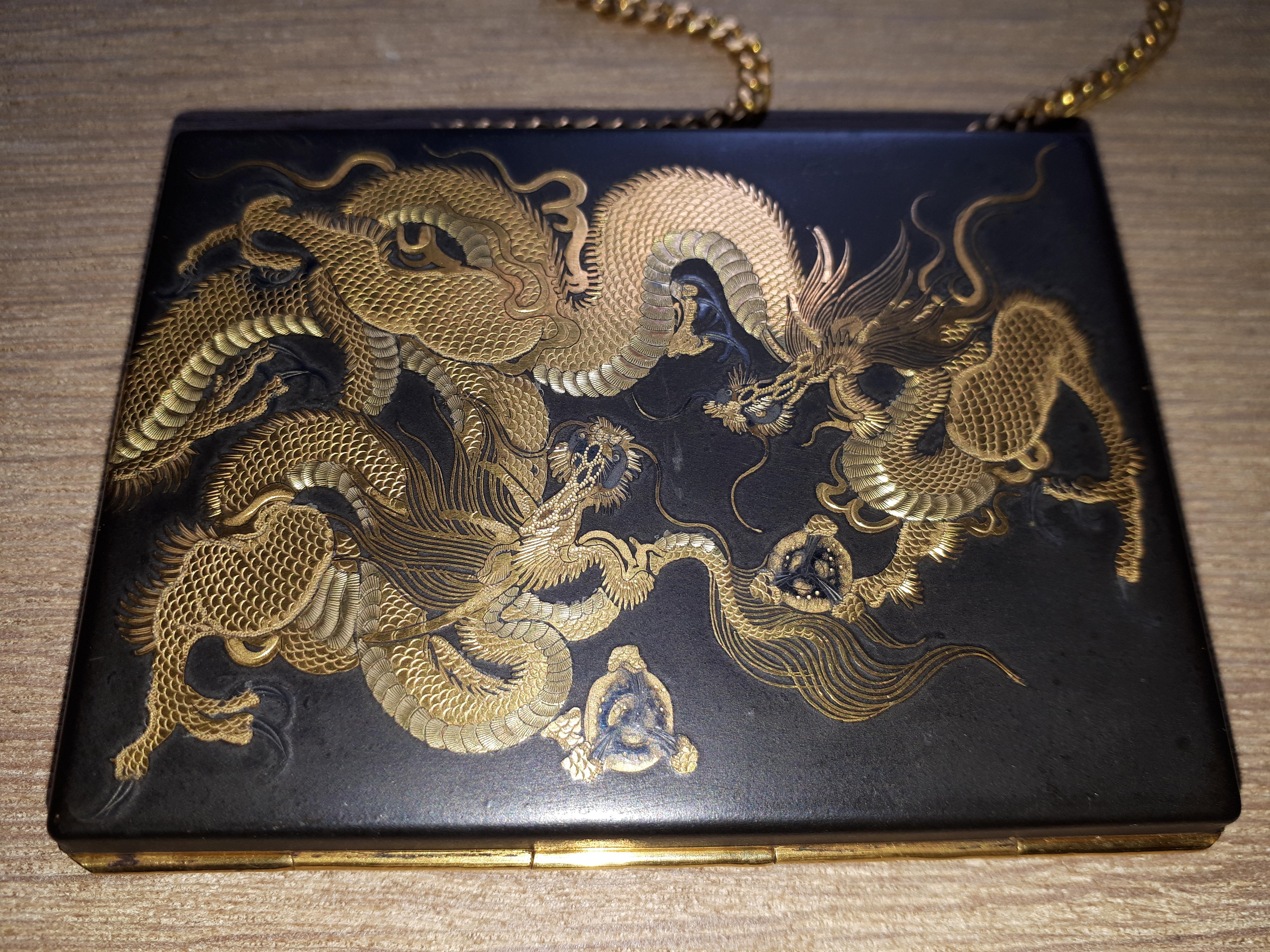 Exceptional powder compact in gold and silver damascened iron (technique called nunome zogan in Japan). It is signed 