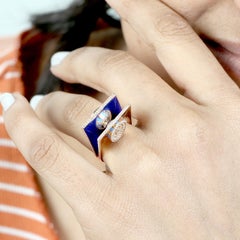 Power Drum Inside a Open Book Design Ring with Rose Gold, Ceramic and Diamonds