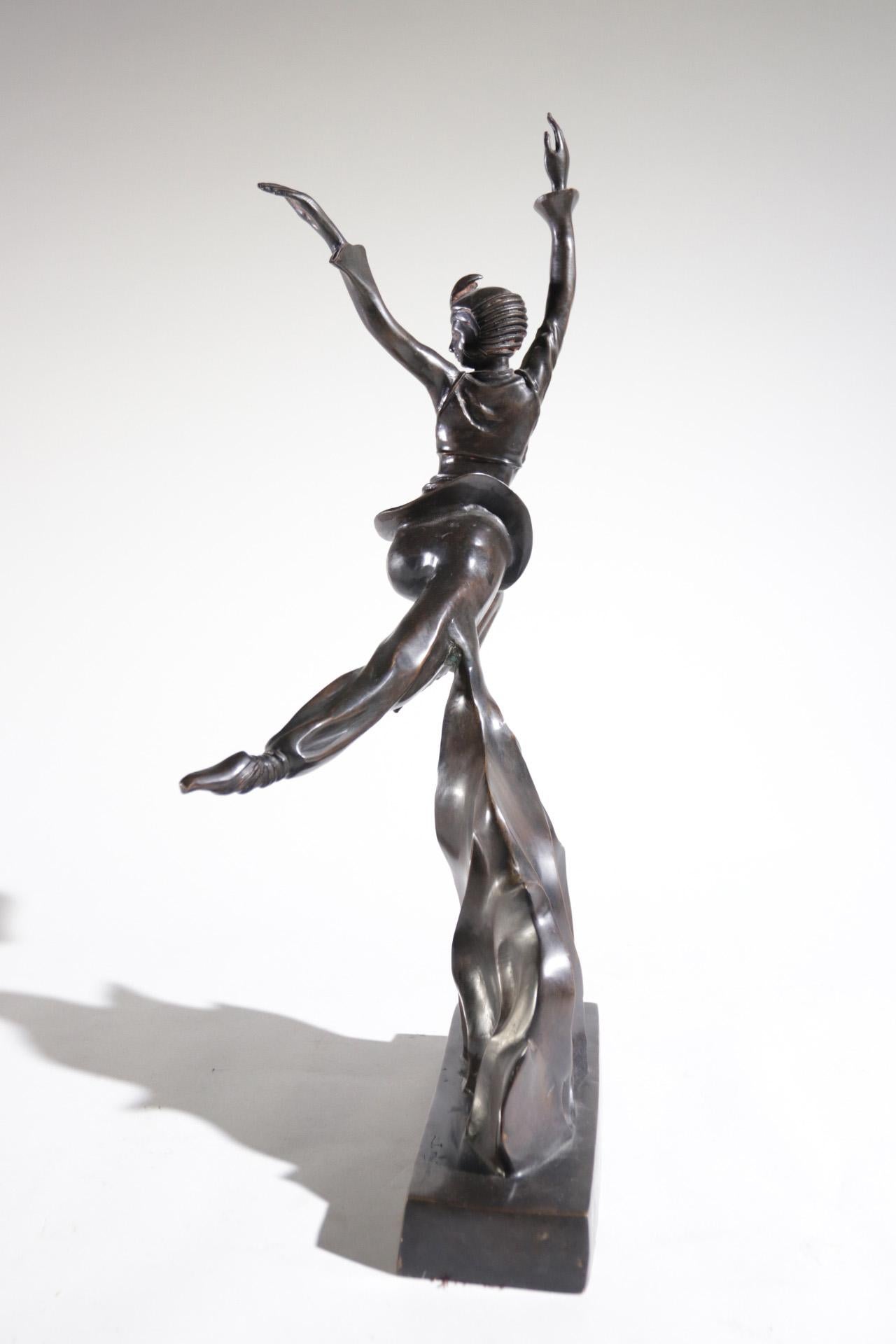 Female Art Deco bronze sculpture of a woman signed J. Moigniez.
Beautiful patina and Powerful design.

    