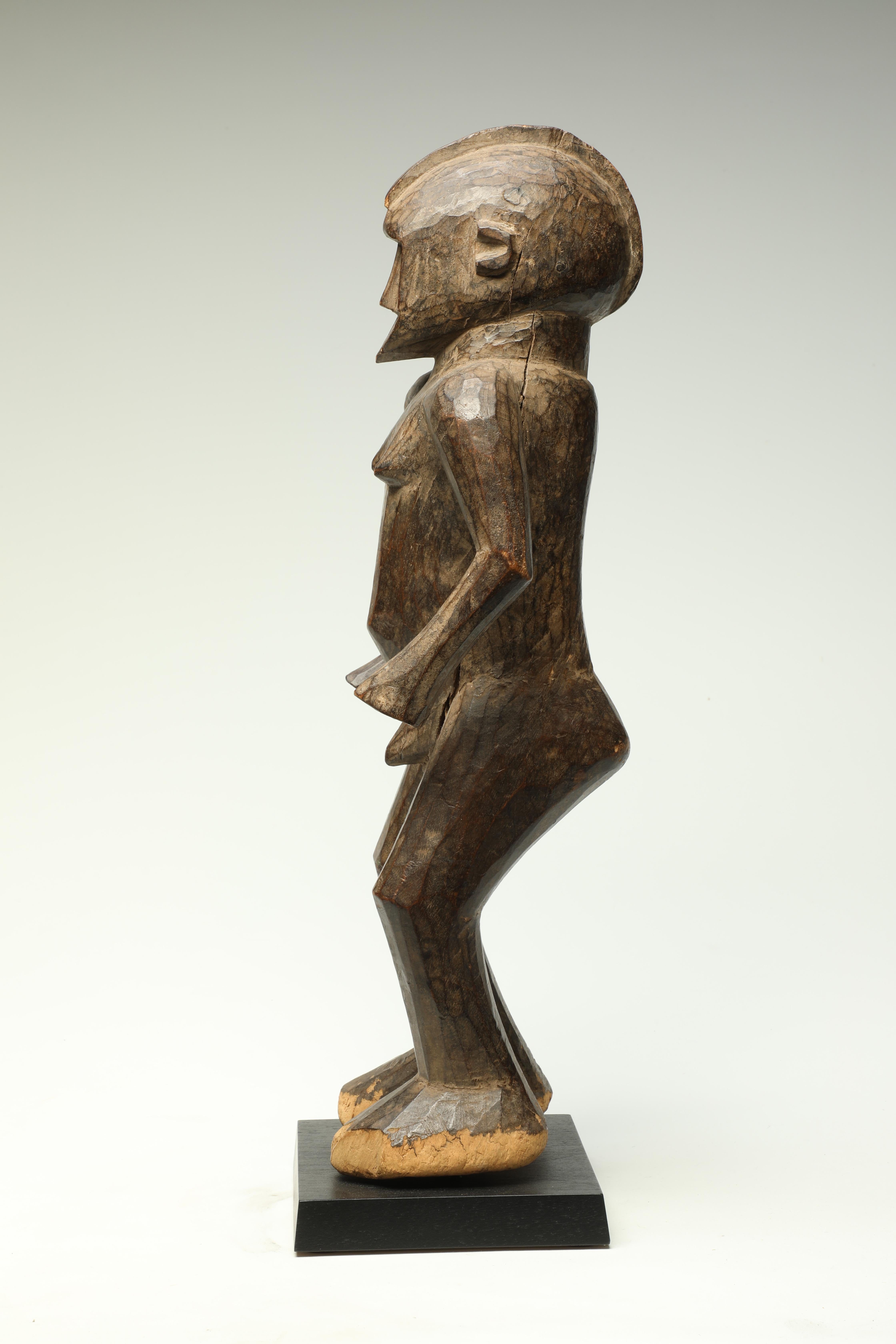 Sculpté à la main Puissante figurine cubiste classique en bois de Bobo debout Afrique Ex J. Willis en vente