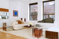 Mirrored Side Table with Hidden Power Outlet in Drawer by Lauren Rottet