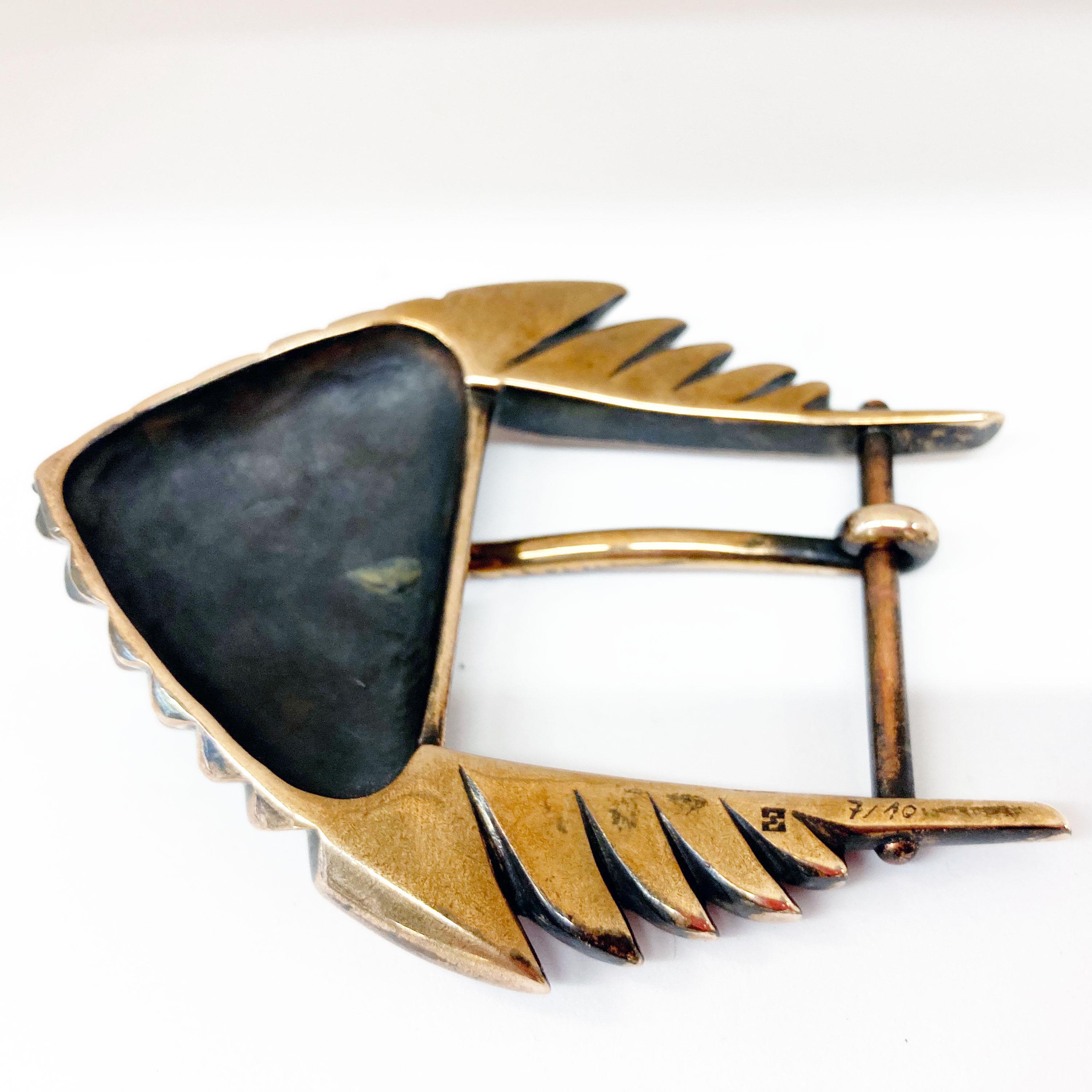 This very solid and powerful statement Belt Buckle made in Bronze fascinates with a crazy wild look. The three dimensional design evoques a stong contrast between light and shadow. Model 