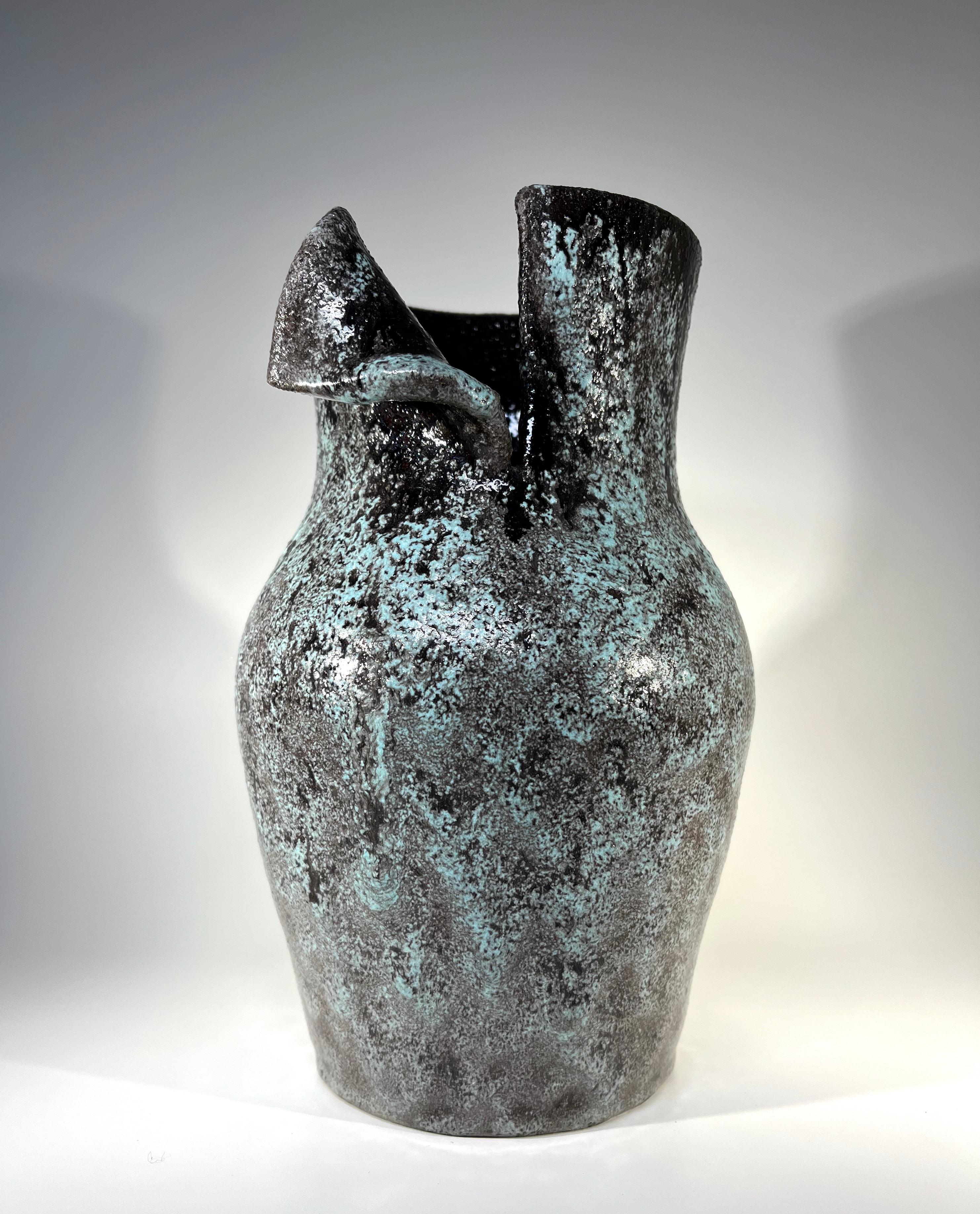 Brutalist in form, coupled with an impressive glaze of pale blue and charcoal, this is a powerful statement vase commanding presence
Phenomenal and tactile piece by Accolay, France
Circa 1960's
Signed Accolay to base
Height 9 inch, Diameter 6