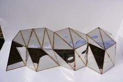 Powerlines Bench in Welded Mirror-Polished Stainless Steel by Julian Mayor