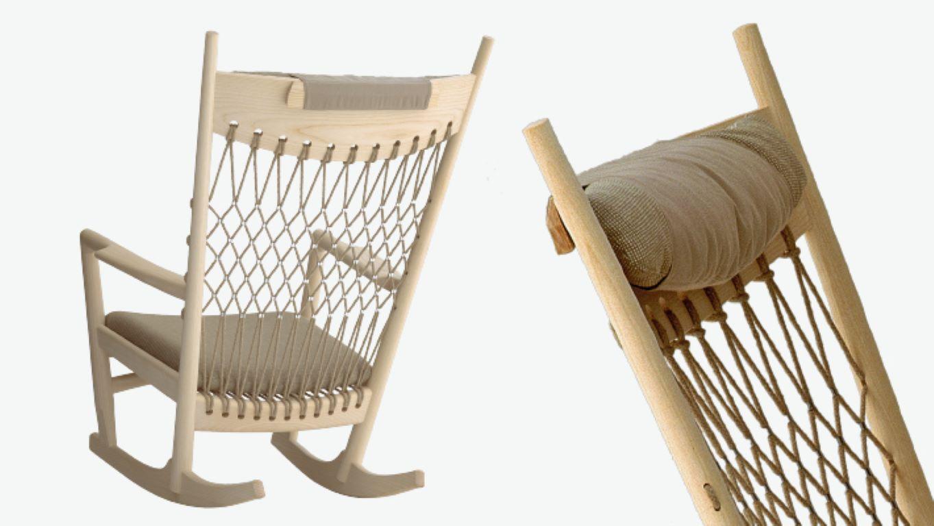 This PP124 rocking chair is made in Denmark with carved soaptreated ash and comes with flag halyard in nature. The clips connecting the flag halyard come in stainless steel and the seat and neck cushions come in standard V Klint fabric with Cotil