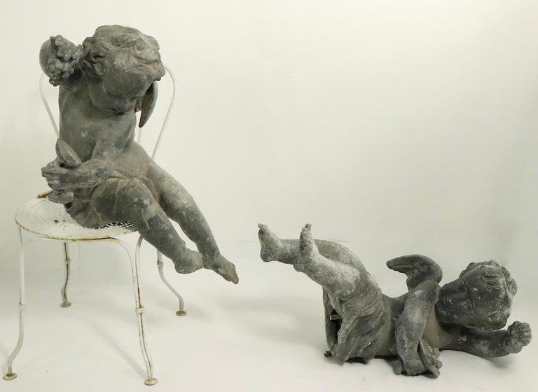 Pair of 19th Century Cast Lead Cupids from a Municipal Fountain For Sale 9