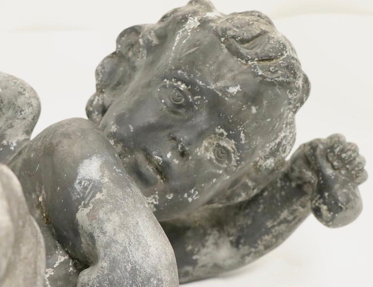 Pair of 19th Century Cast Lead Cupids from a Municipal Fountain In Good Condition For Sale In New York, NY