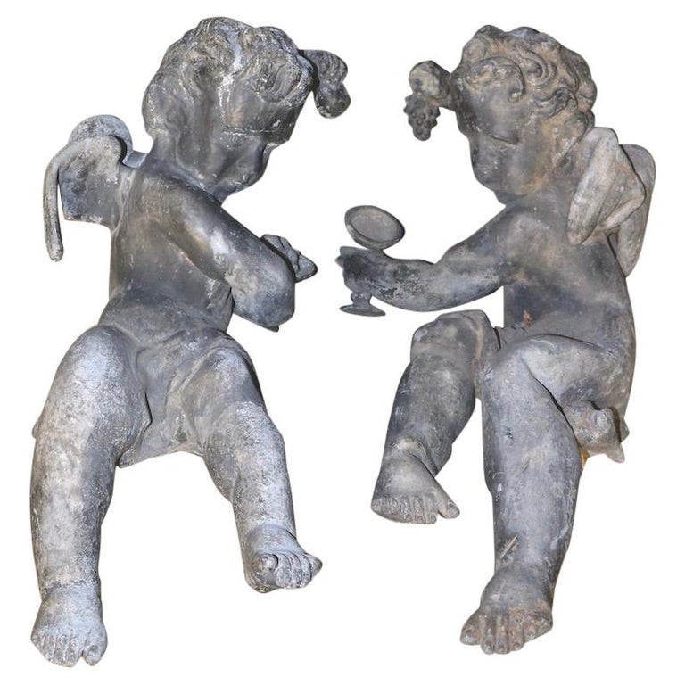 Pair of 19th Century Cast Lead Cupids from a Municipal Fountain For Sale