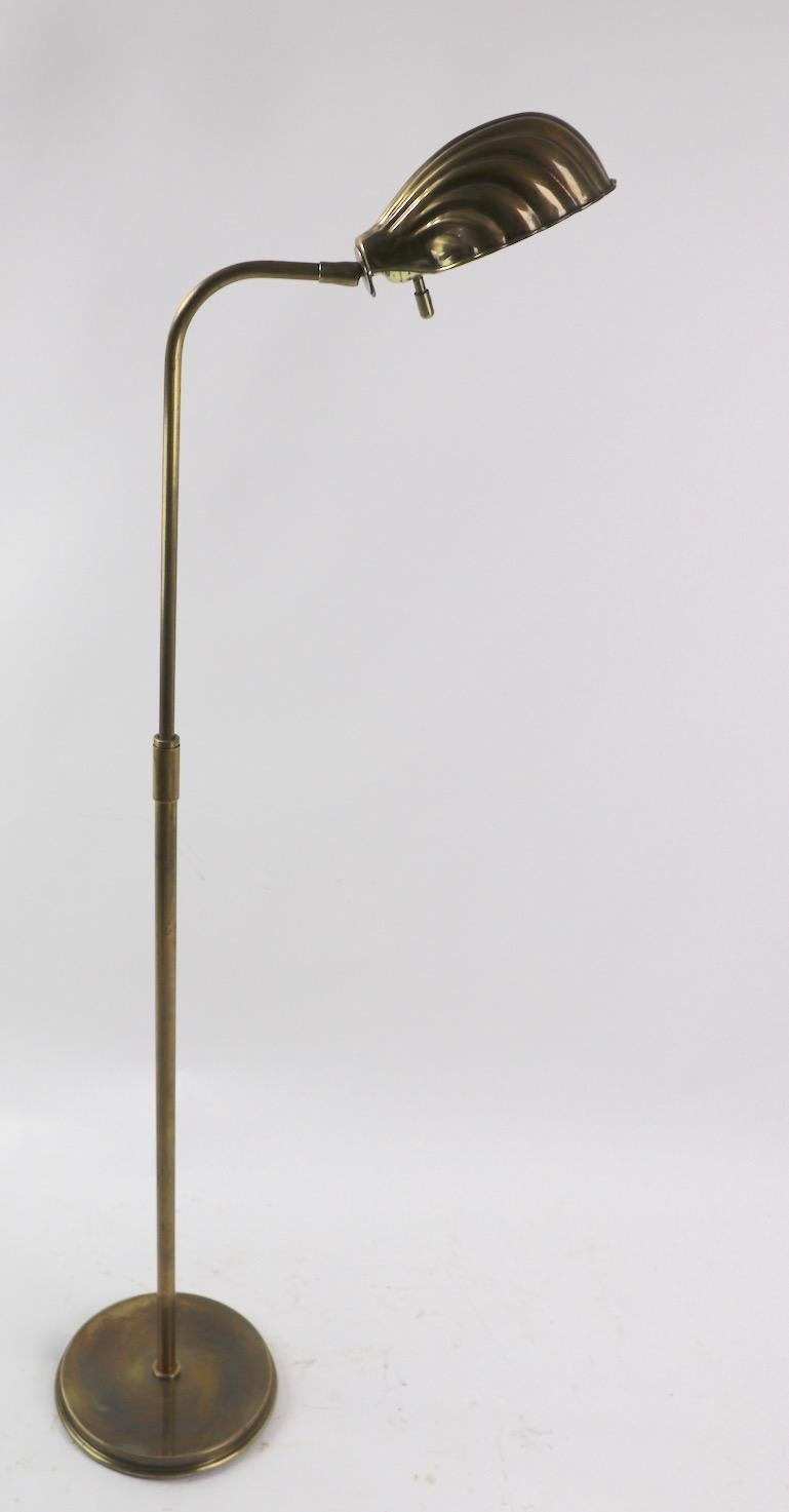 American Pair of Adjustable Brass Shell Shade Floor Lamps