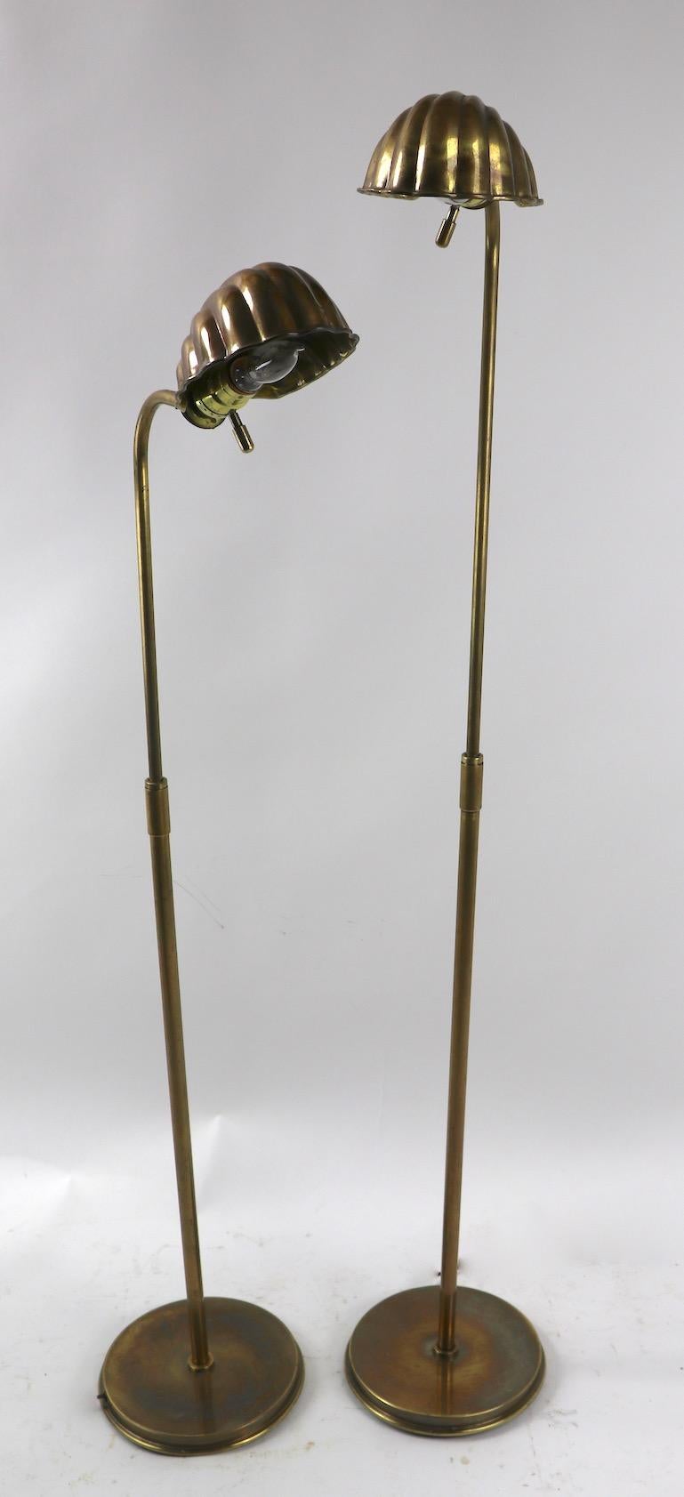 20th Century Pair of Adjustable Brass Shell Shade Floor Lamps
