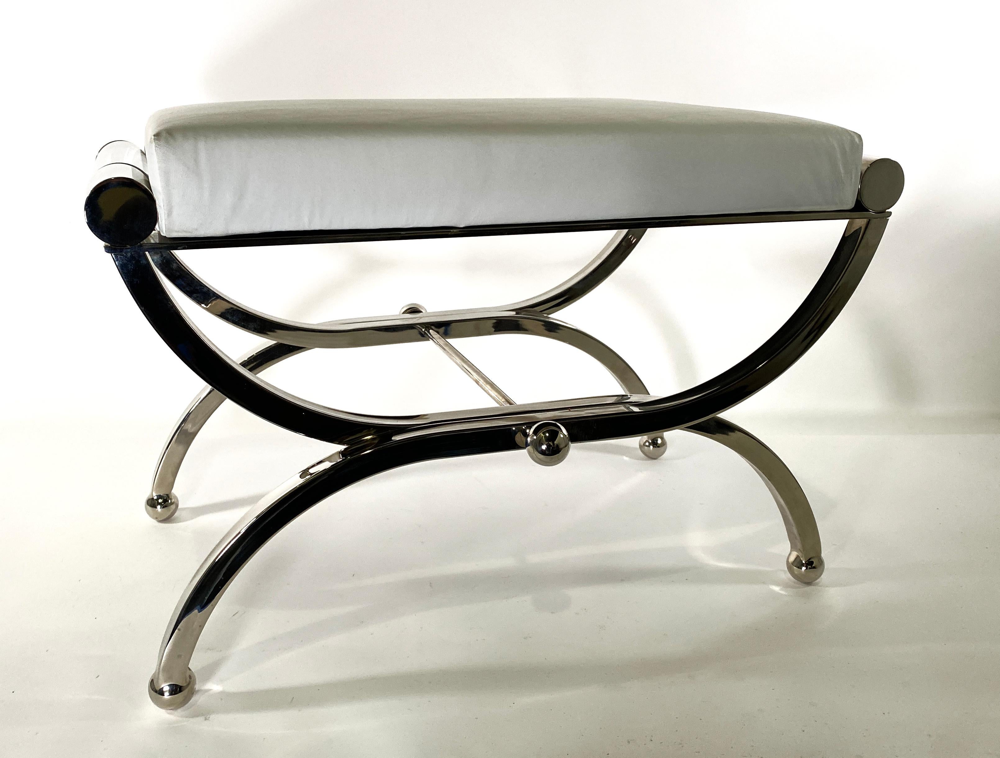 The upholstered seat with chunky lucite cylinders, resting on nickel legs- these are part of Charles Hollis Jones new line which we are proud to represent- We can order these in brass as well- production will be limited to 12 pieces total.  6 have