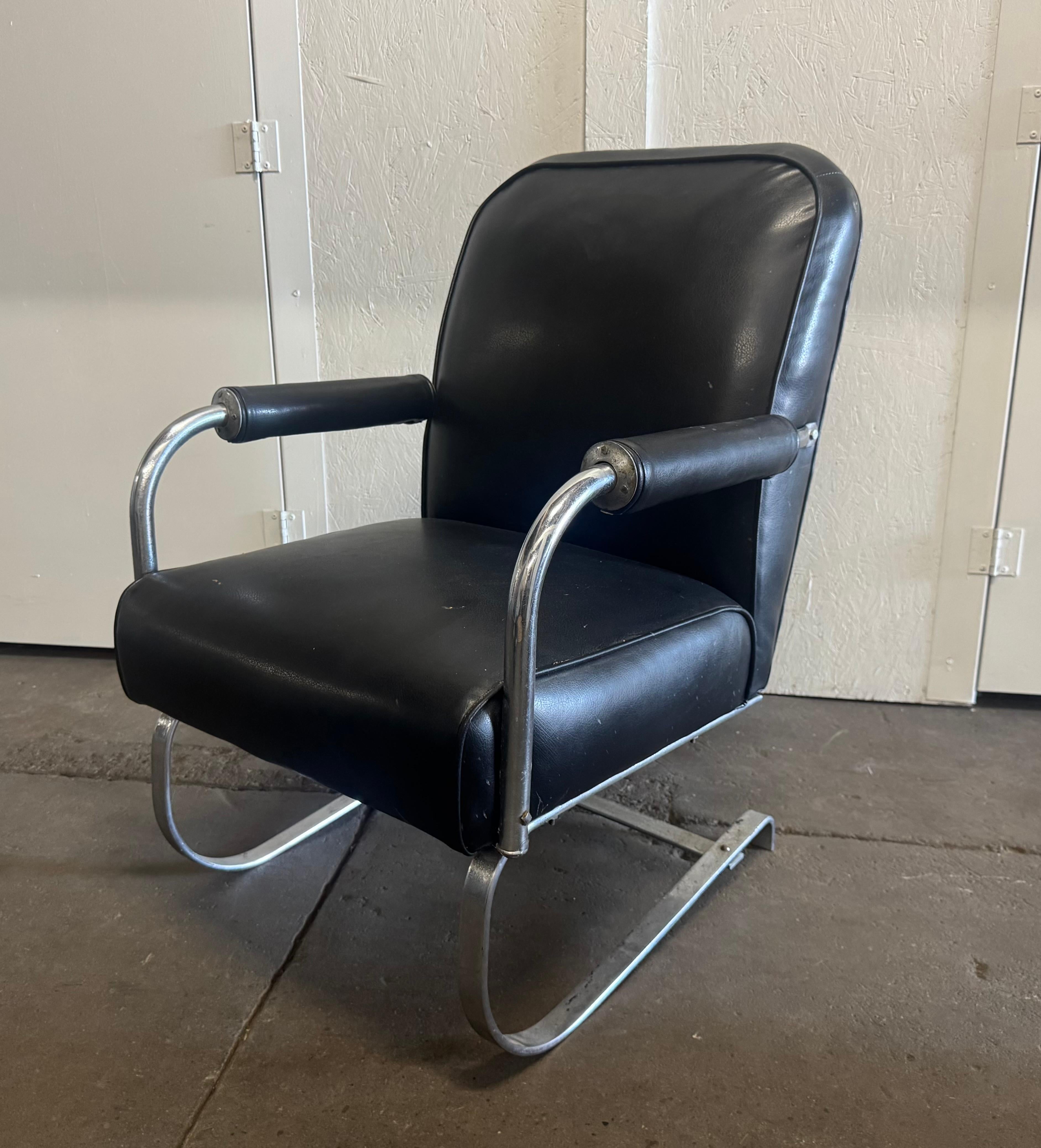 This pair of supremely comfortable American art deco chairs was designed by Kem Weber (1889-1963) in 1937 for Lloyd Mfg.

Known as the 