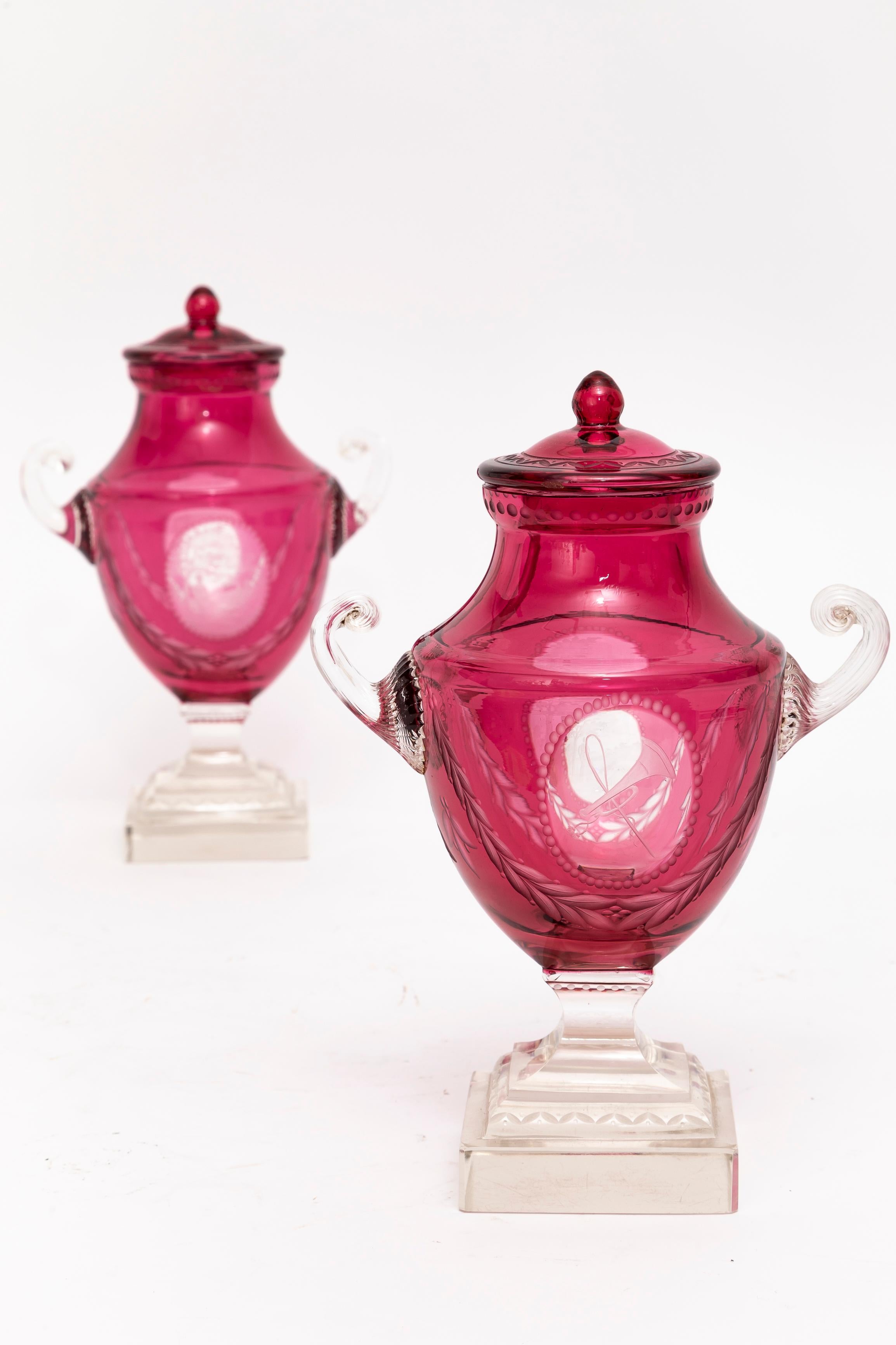 French Pr. Baccarat Red Cut-to-Clear Covered Vases w/ Central Cameo of Hunting Trophies For Sale
