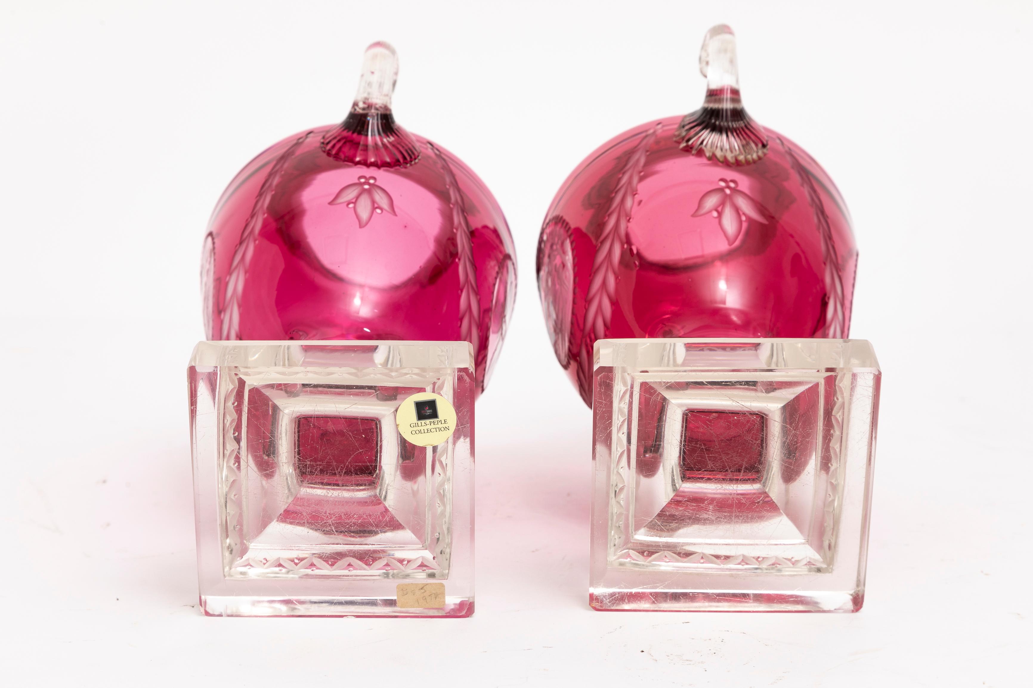 Late 19th Century Pr. Baccarat Red Cut-to-Clear Covered Vases w/ Central Cameo of Hunting Trophies For Sale