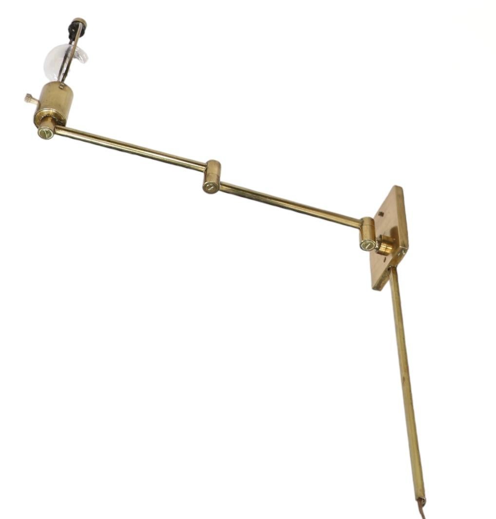 Pr. Brass Flex Arm Wall Sconces by Hansen c. 1970's  In Good Condition For Sale In New York, NY