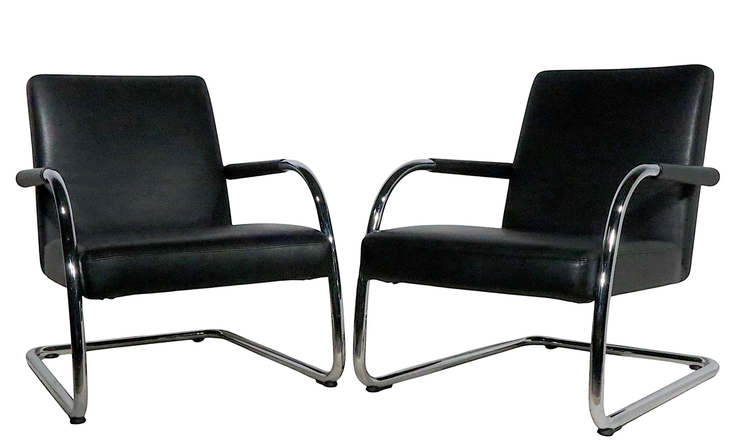 Hollywood Regency Pr.  Cantilevered Black Leather and Chrome Lounge Chairs by Citterio for Vitra For Sale