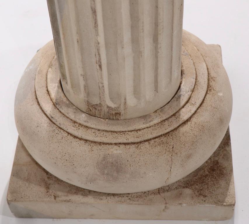 Pr. Carved Limestone Column Pedestals with Ionic Capitals In Good Condition For Sale In New York, NY
