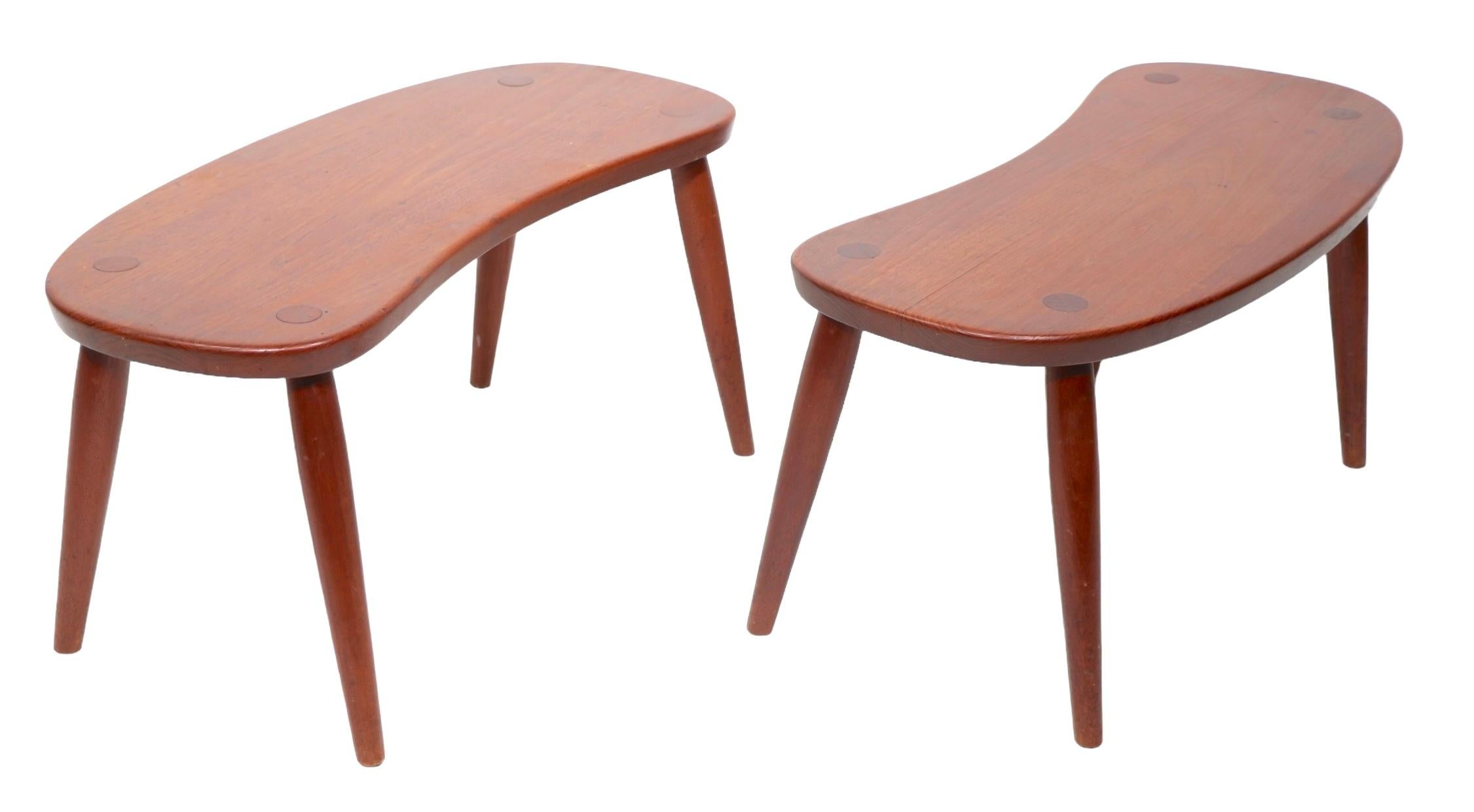Exceptional pair of kidney shaped end, or side tables,  marked Illums Bolighus Kobenhavn ( Copenhagen ) on verso, design attributed to Josef Frank, circa 1950's. The tables are in very fine, clean, original, ready to use condition, showing only