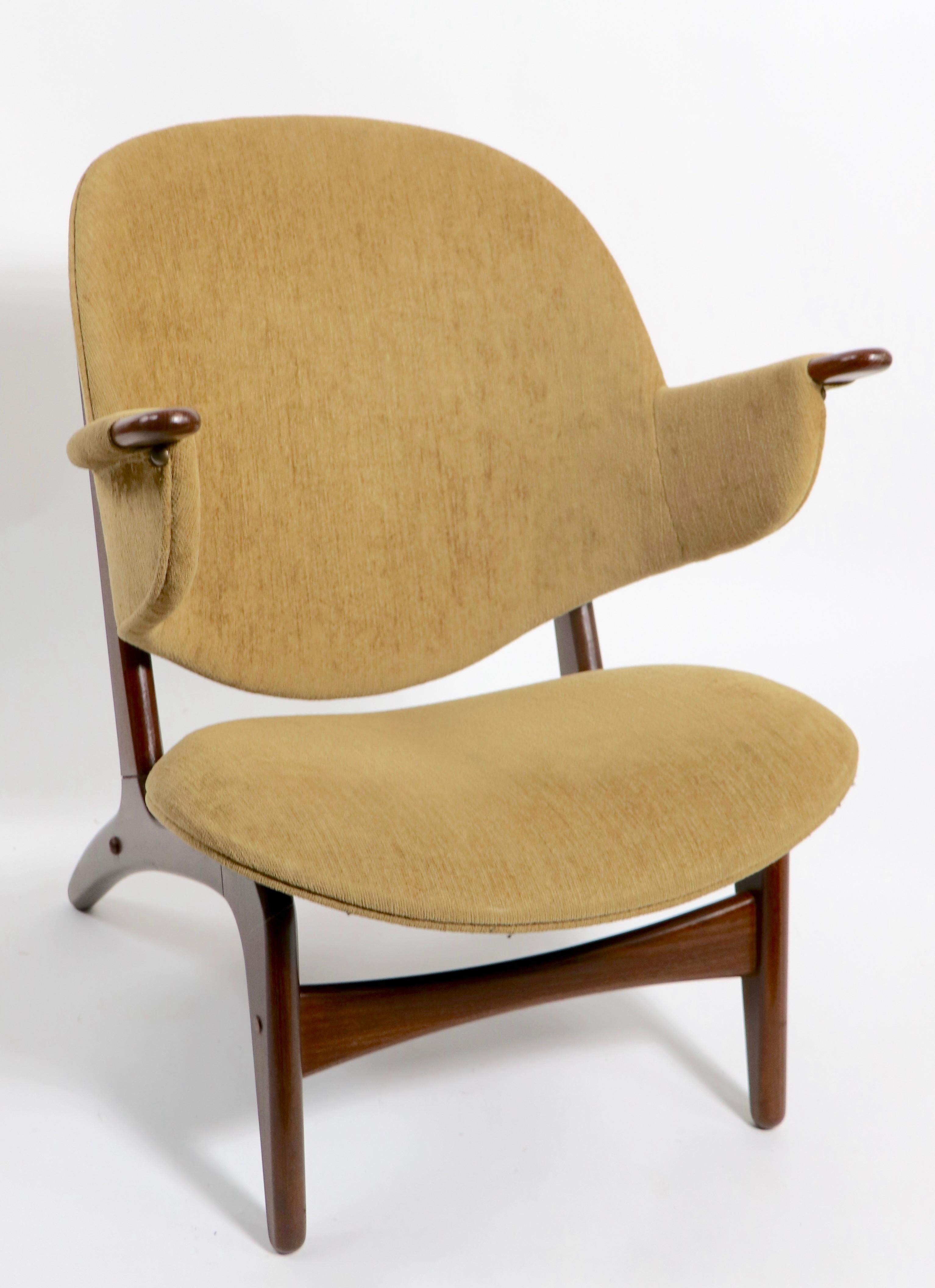 Chic architectural Danish modern paddle arm lounge chairs attributed to Poul Jessen. Both chairs have been newly restored, reupholstered and the wood frames have been refinished, one chair shows a professional repair to the leg joint ( see images ).