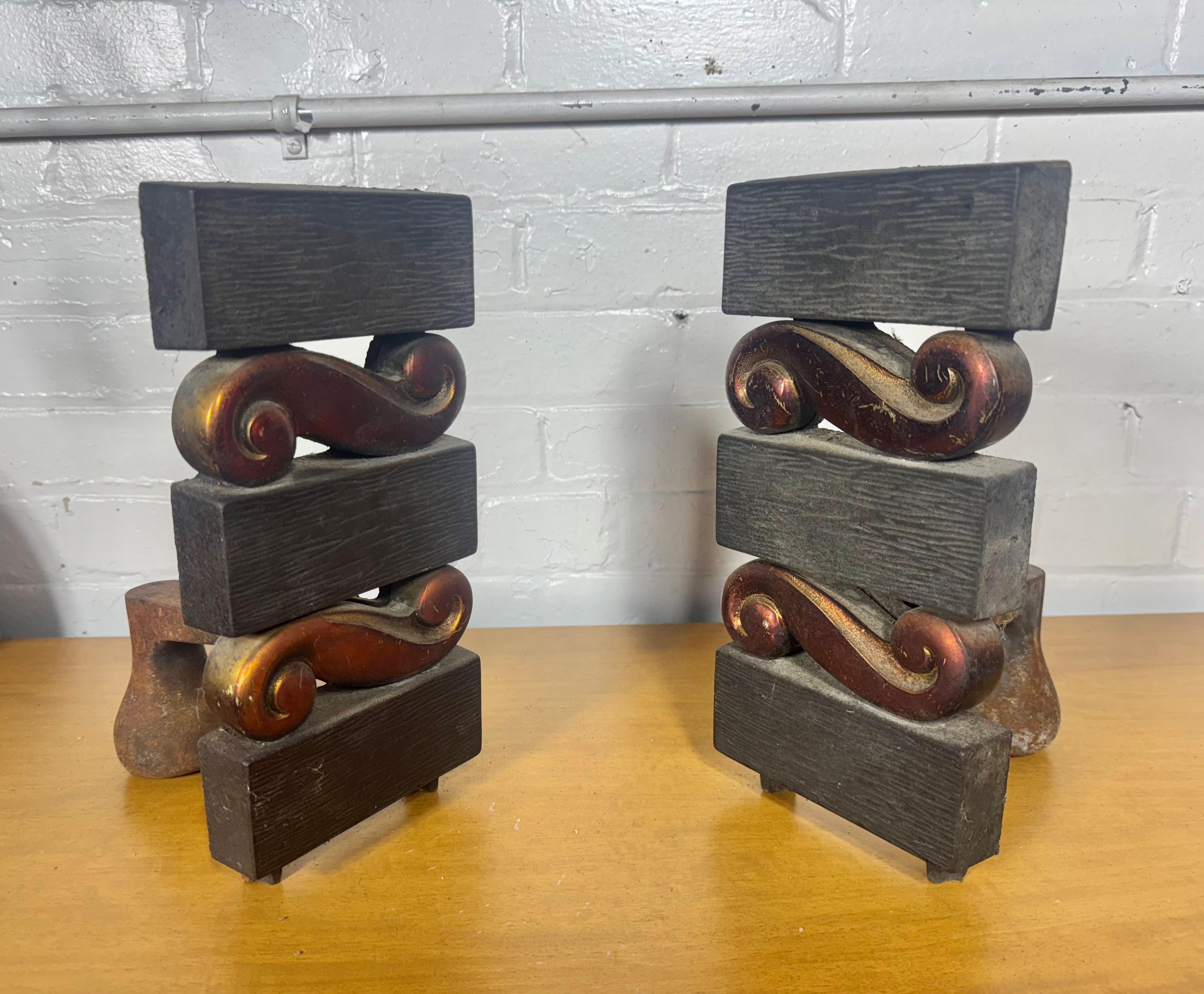 This pair of andirons, designed by the iconic modernist Donald Deskey for Bennett, exemplifies mid-century American / Art Deco design at its most refined. Produced in the late 1940's -1950s, these andirons showcase Deskey's signature blend of