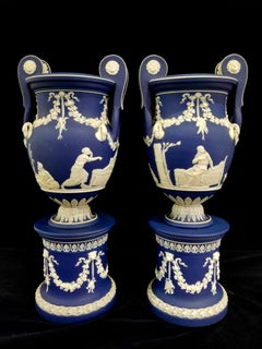 English Jasperware Blue Wedgwood Vases w/ Neoclassical Subjects on Plinths, Pair