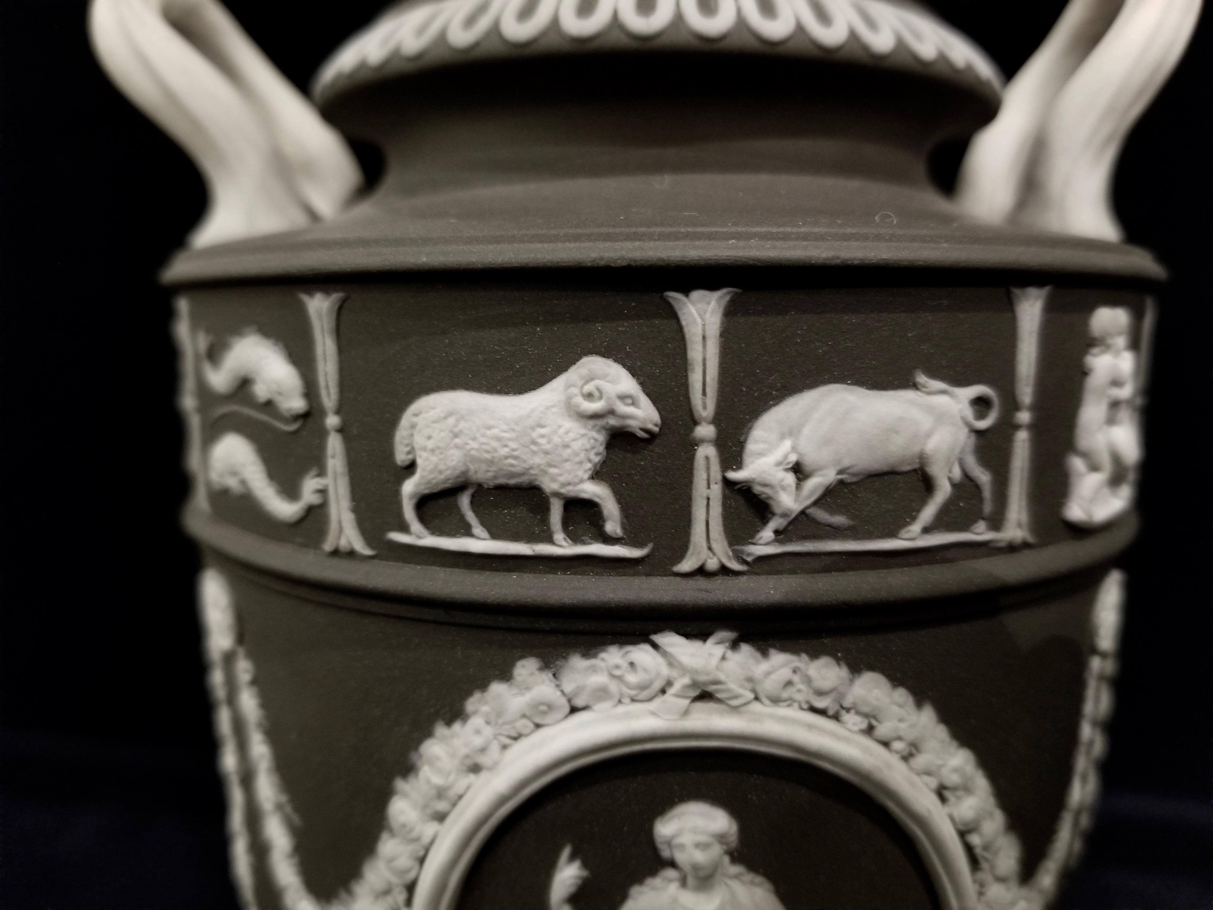 Late 19th Century Pair of English Jasperware Lidded Black-Ground Wedgwood Vases with Zodiac Panels