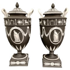 Pair of English Jasperware Lidded Black-Ground Wedgwood Vases with Zodiac Panels