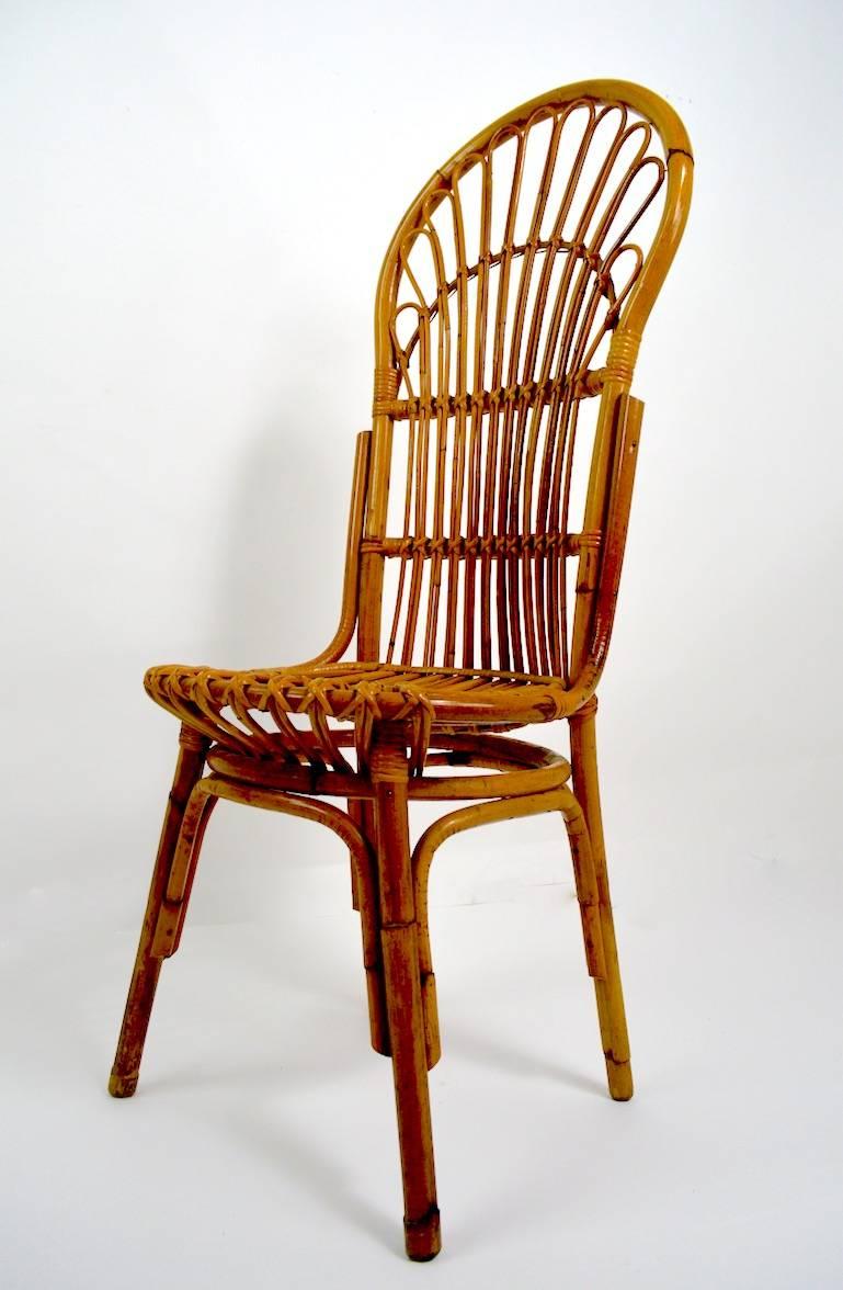 Stylish and chic pair of bamboo chairs, made in Italy after Albini. Both are in very good original condition, one is missing a small bit of wrapping at the seat front, as shown. Seat H 18.