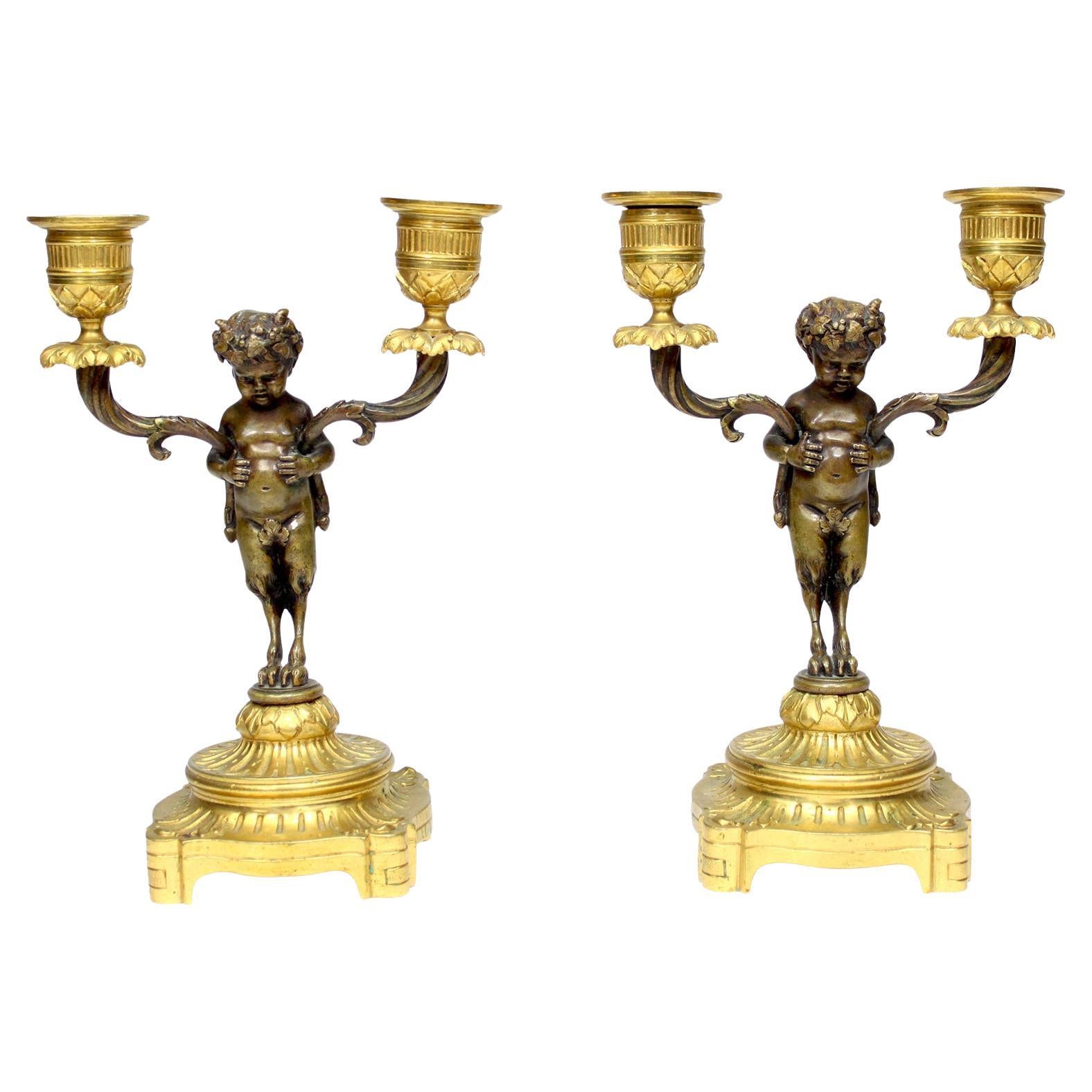 Pr francese del XIX secolo in stile Luigi XV, candelabro in bronzo Baby Bacchus Aft-Clodion