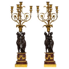 Pr. Candélabre double figuratif d'époque Louis XVI en bronze doré patiné