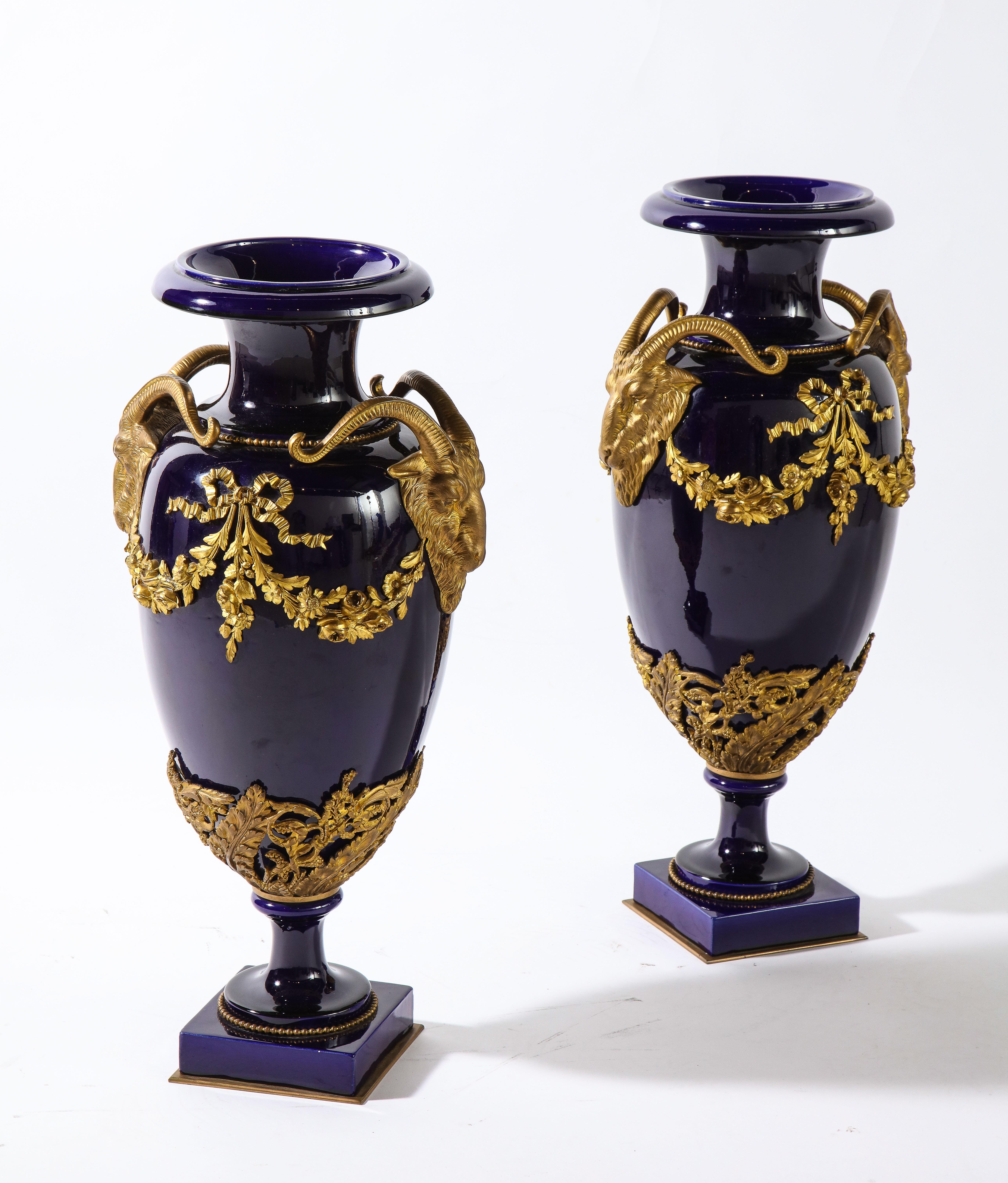 Pr. French Louis XVI Sevres Style Cobalt Blue Porcelain & Dore Bronze Mnt. Vases In Good Condition For Sale In New York, NY