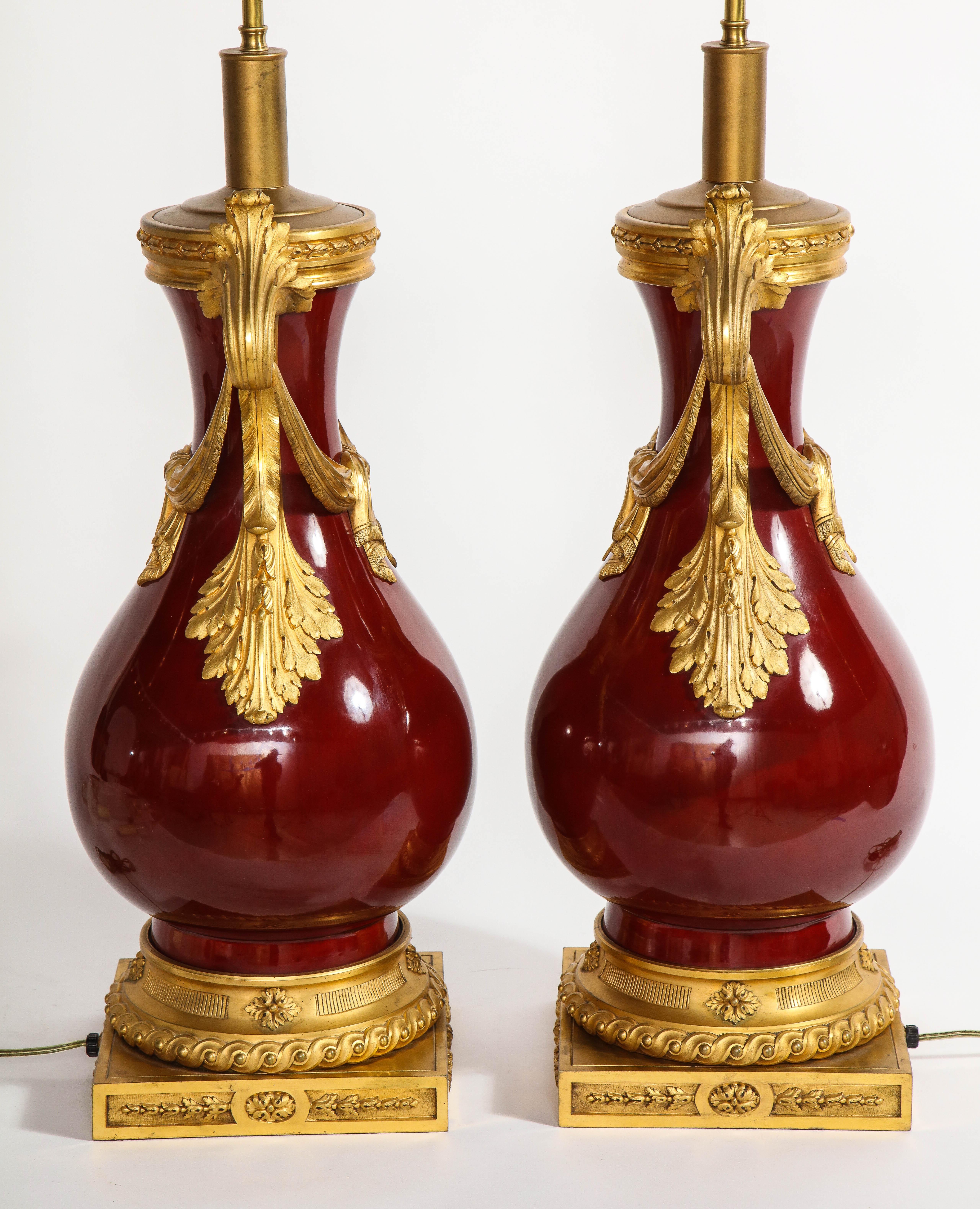 French Louis XVI Style Dore Bronze & Chinese Sang De Boeuf Porcelain Lamps, Pair For Sale 1