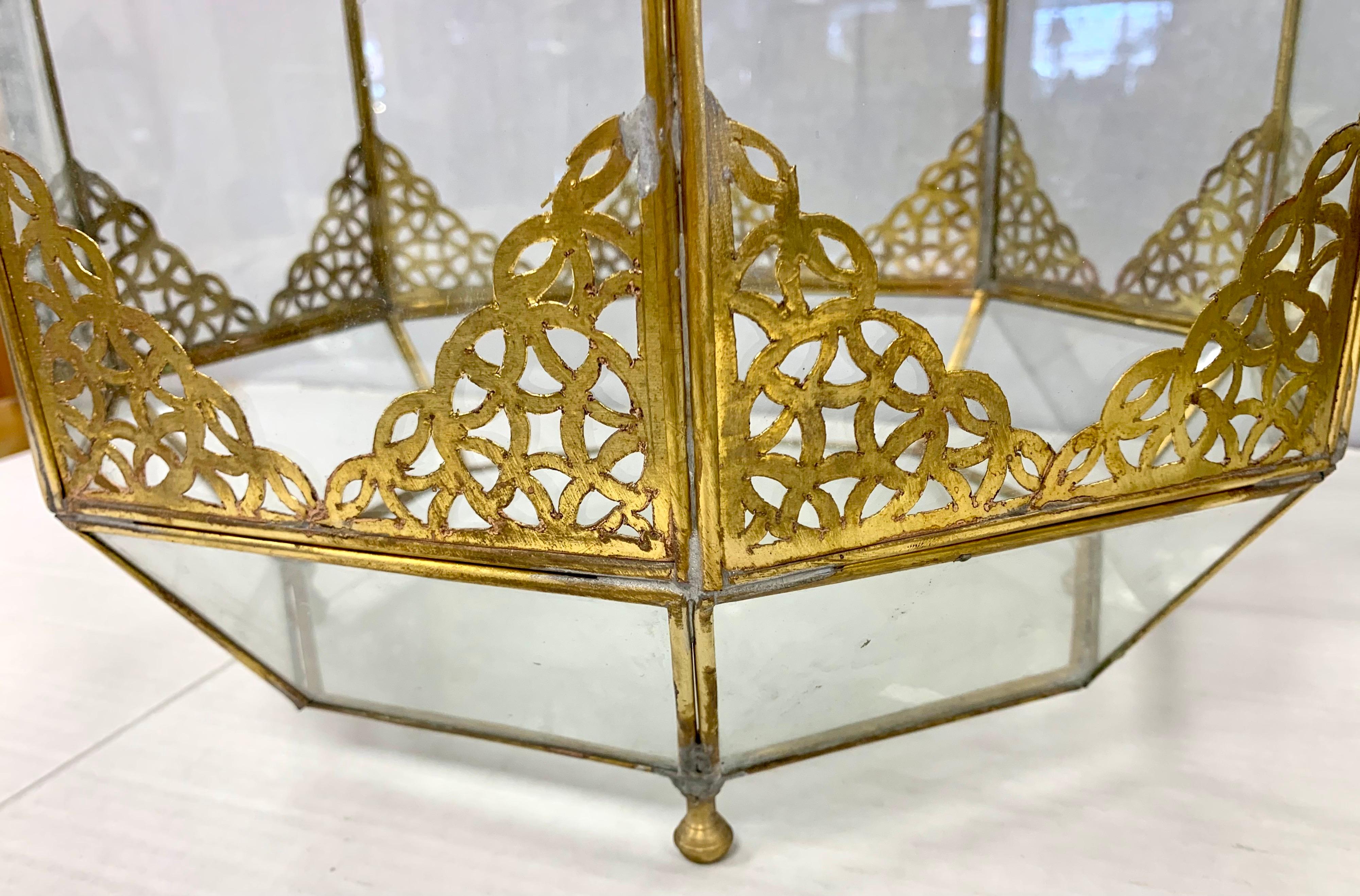 brass and glass lantern