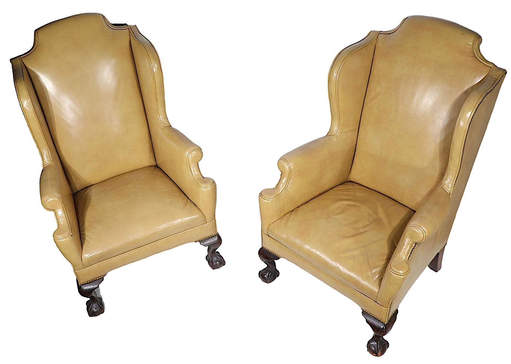 American Pr. Leather Wingback Chairs with Ball and Claw Feet and  Nailhead Studs  For Sale