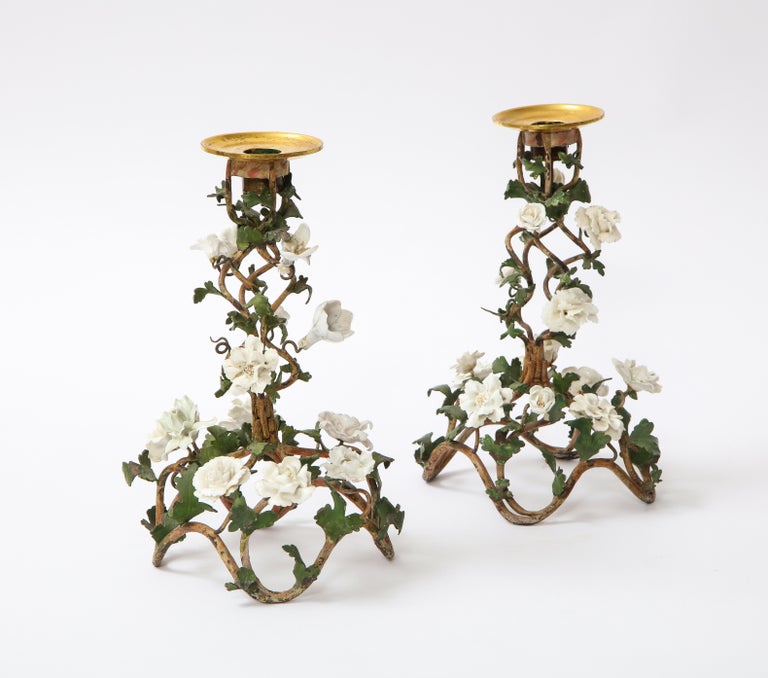 French Pr. Louis XV Patinated Tole Candle Sticks Embellished w/ White Porcelain Flowers For Sale