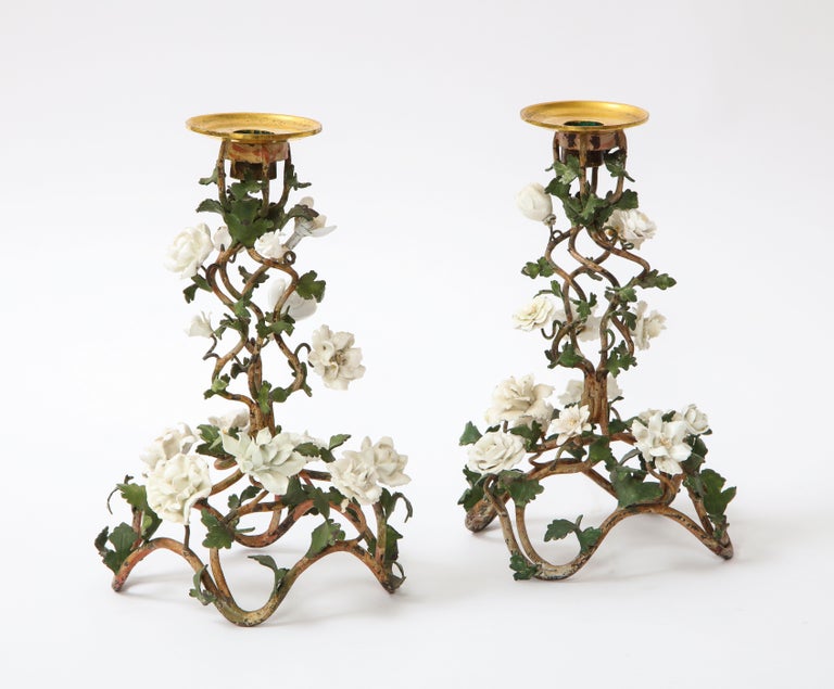 Gilt Pr. Louis XV Patinated Tole Candle Sticks Embellished w/ White Porcelain Flowers For Sale