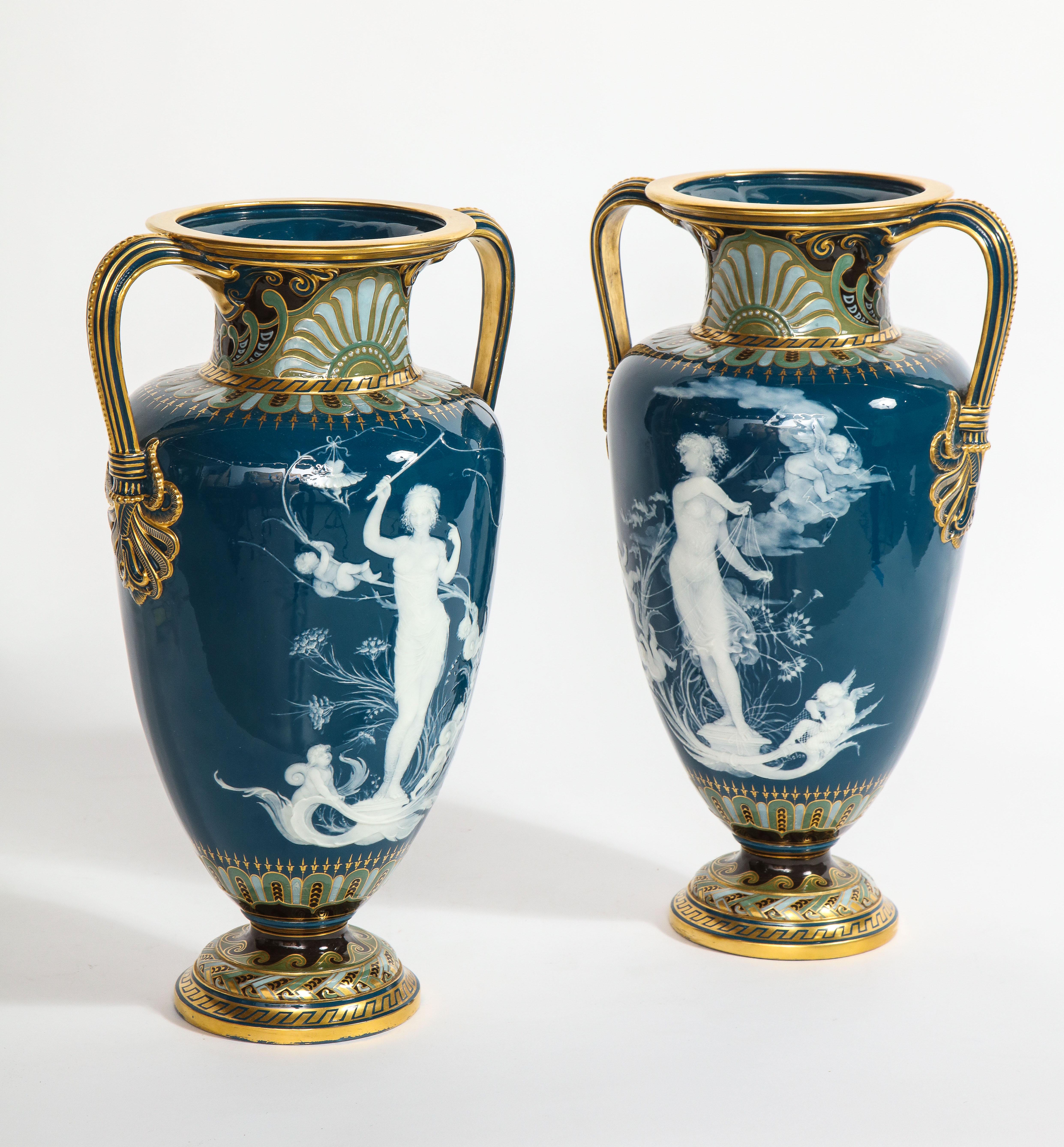 Belle Époque Pr. Mintons Pâte-sur-pâte Blue-Ground Vases, 'Too Fast' & 'Too Slow', L. Solon