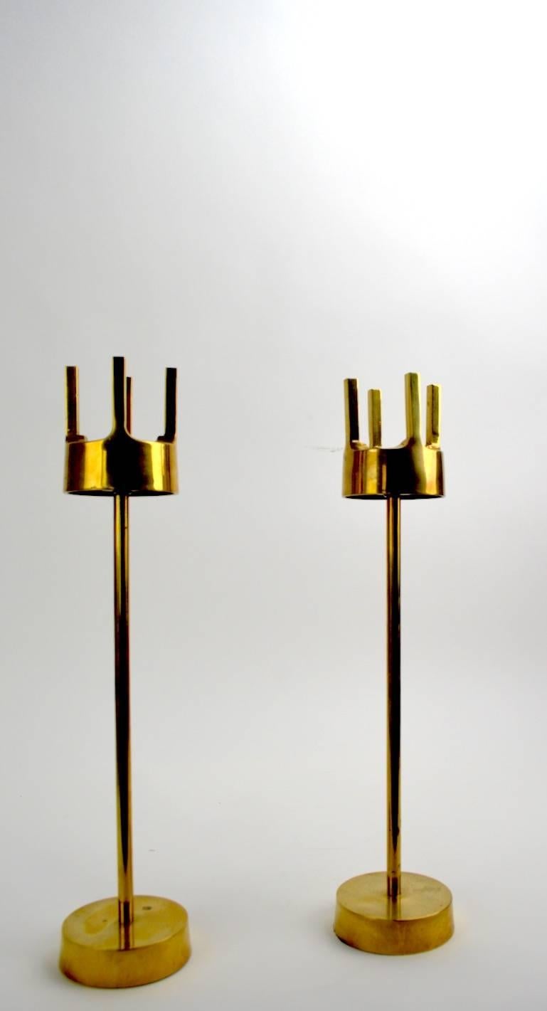 Nice tall pair of midcentury brass candle holders in the style of Pierre Forsell, for Skultuna, unsigned.
Clean original condition showing only minor cosmetic wear, normal and consistent with age.
 