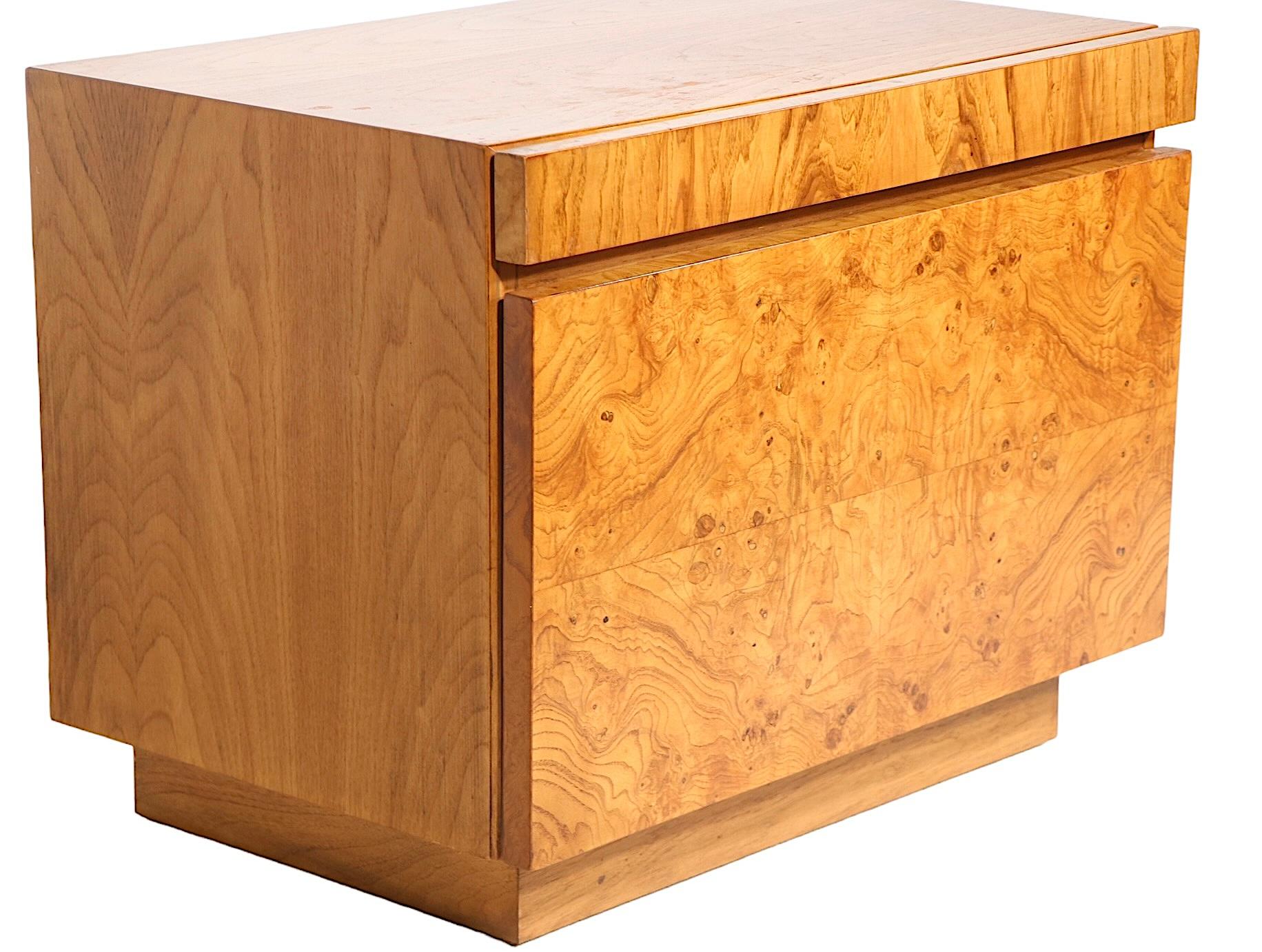 Exceptional pair of modernist night stands by Lane Alta Vista, design attributed to Milo Baughman, circa 1970's. The night tables feature  vibrant burl veneer drawer fronts,  rich walnut sides and top surfaces. Each case has a deep lower drawer