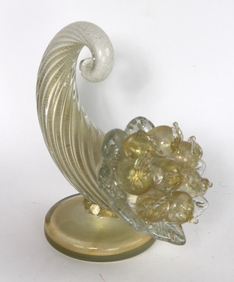 Wonderful pair of gold inclusion art glass cornucopias by Barovier and Toso, Murano, Italy, circa 1950s. Both show some loss (chips to fruit etc) and one is missing a leaf pedal, as shown, While not in perfect condition, these show well and are